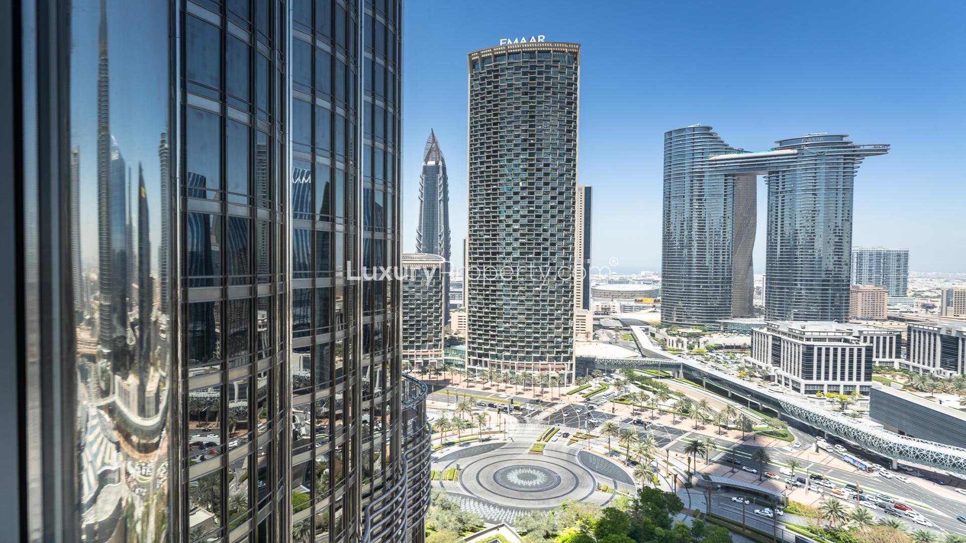 Studio apartment interior with DIFC and Sheikh Zayed Road views through large windows