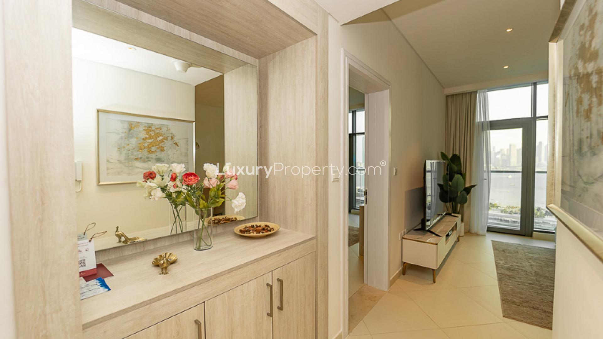 Modern kitchen in 1-bedroom apartment, Seven Palm, Palm Jumeirah, featuring sleek appliances and cabinets