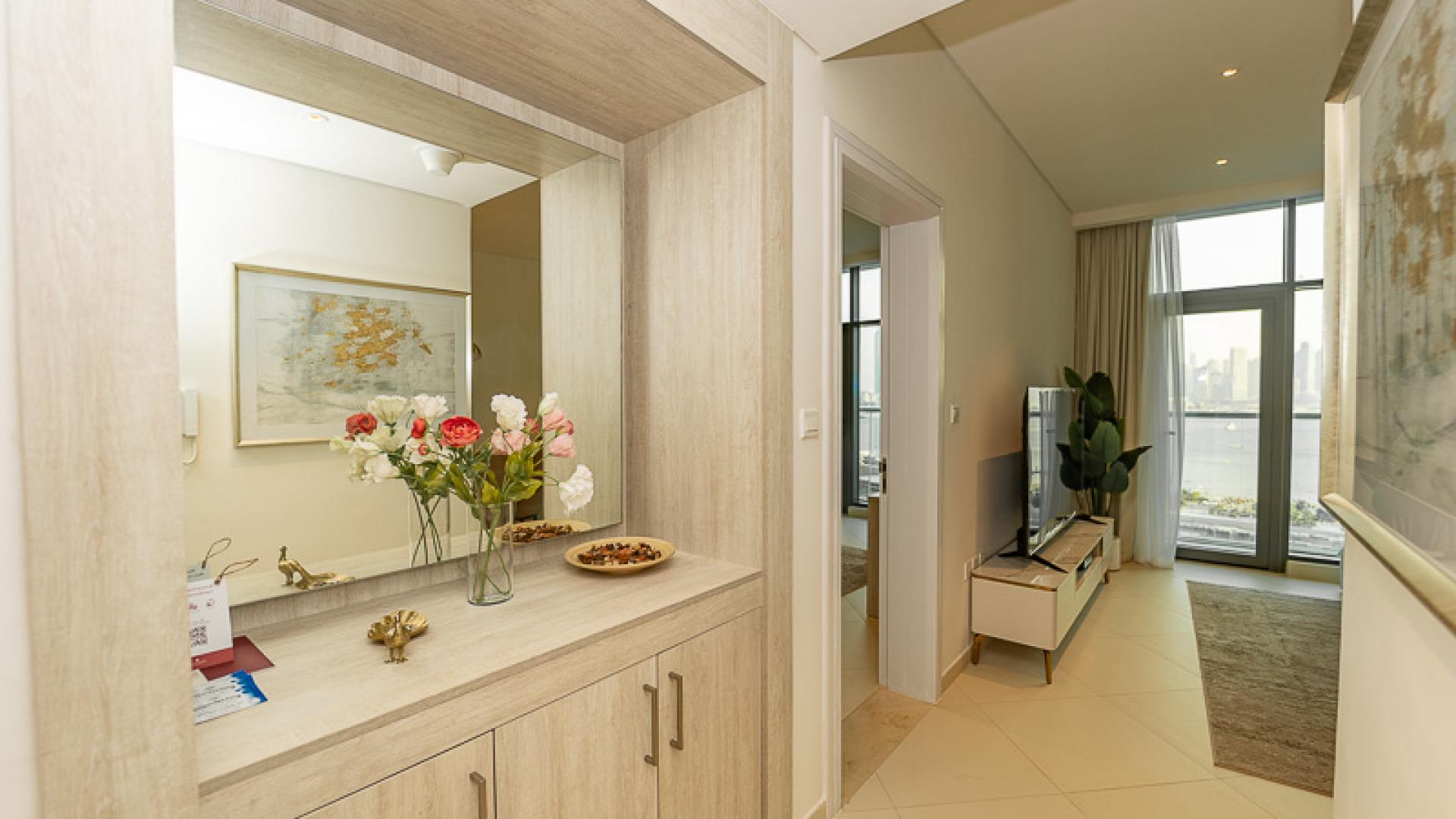 Modern kitchen in 1-bedroom apartment, Seven Palm, Palm Jumeirah, featuring sleek appliances and cabinets