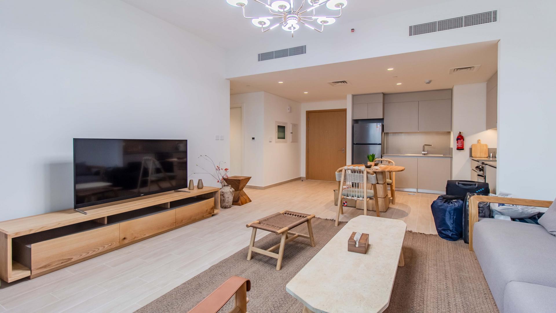 Brand new furnished apartment living area and kitchen at Creek Beach, Dubai Creek Harbour