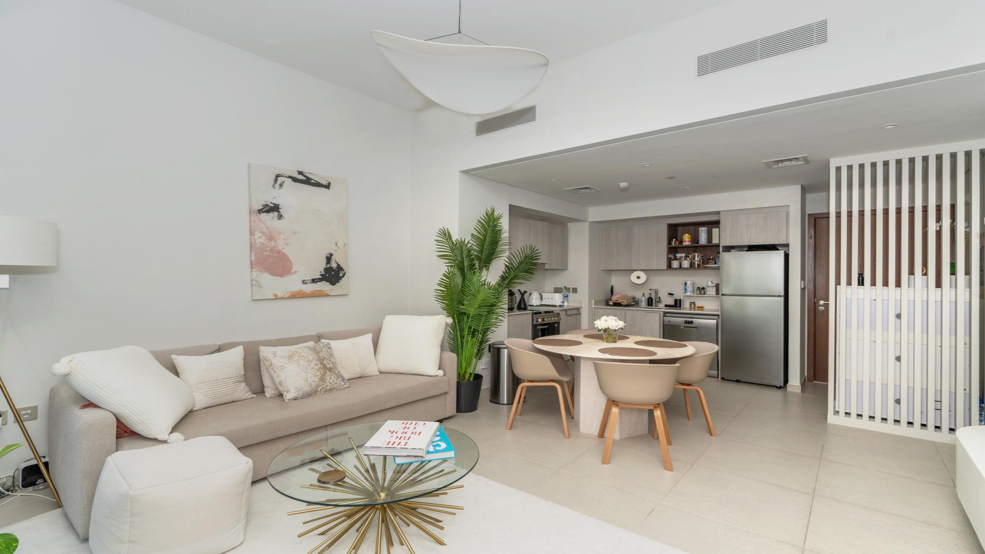 Bright modern kitchen and dining area in 1-bedroom apartment, Dubai Creek Harbour