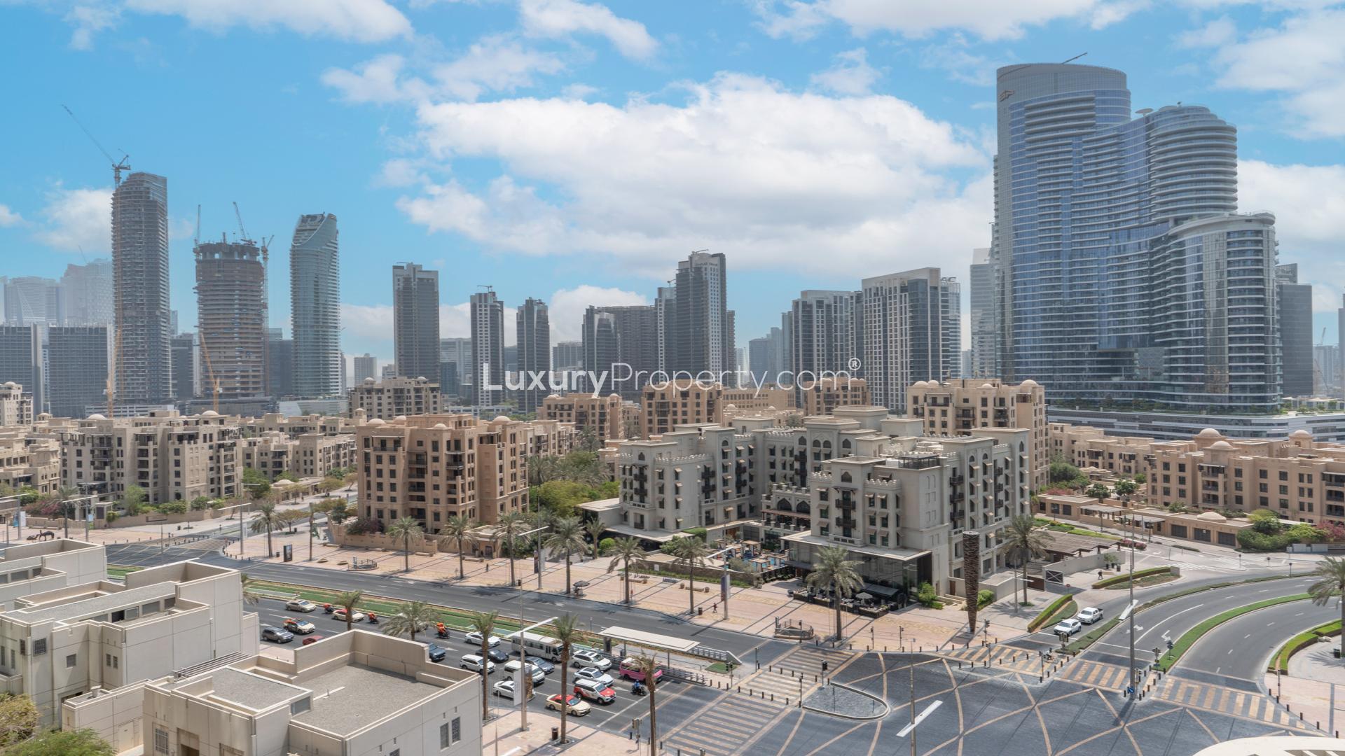 Empty apartment room with large window view in Boulevard Central Towers, Downtown Dubai