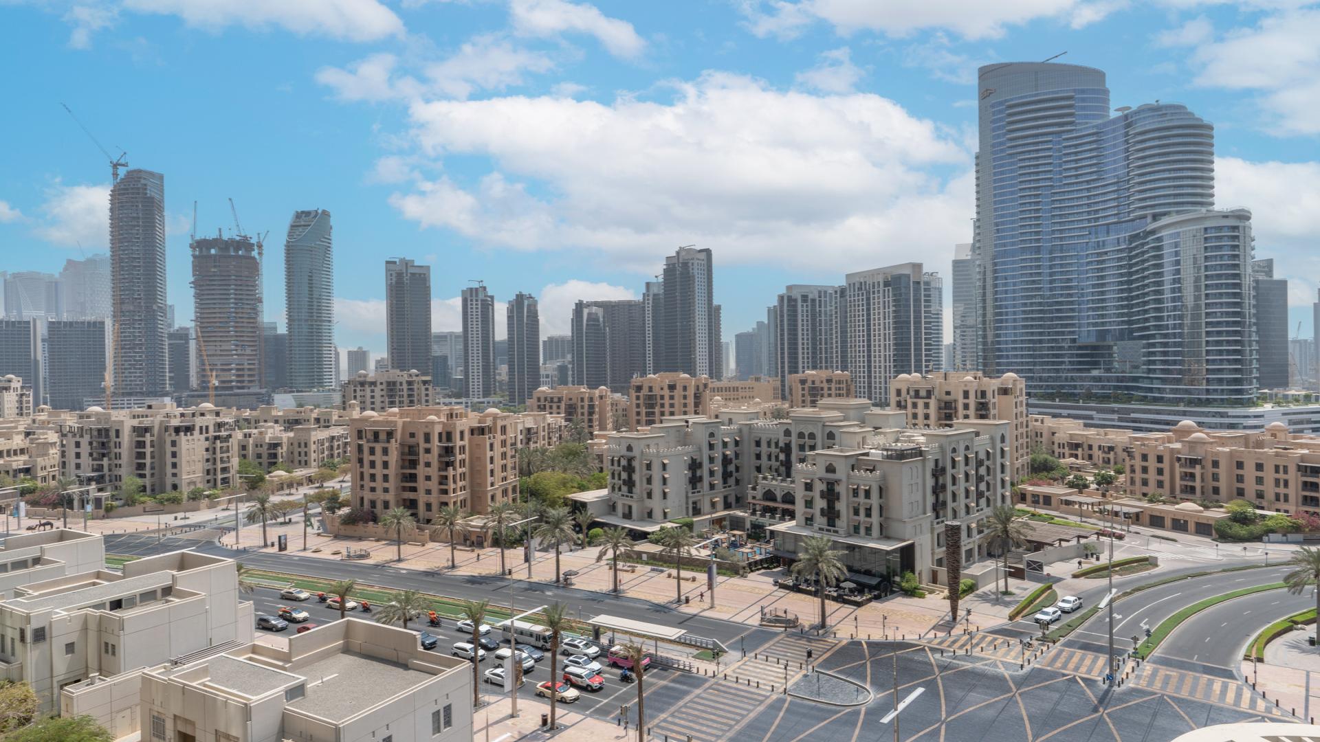 Empty apartment room with large window view in Boulevard Central Towers, Downtown Dubai