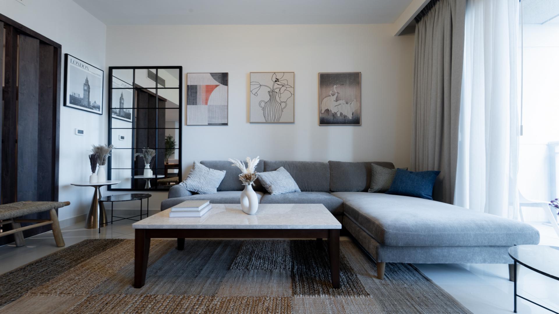 Modern living room in Harbour Views 1 apartment, Dubai Creek Harbour, featuring stylish decor