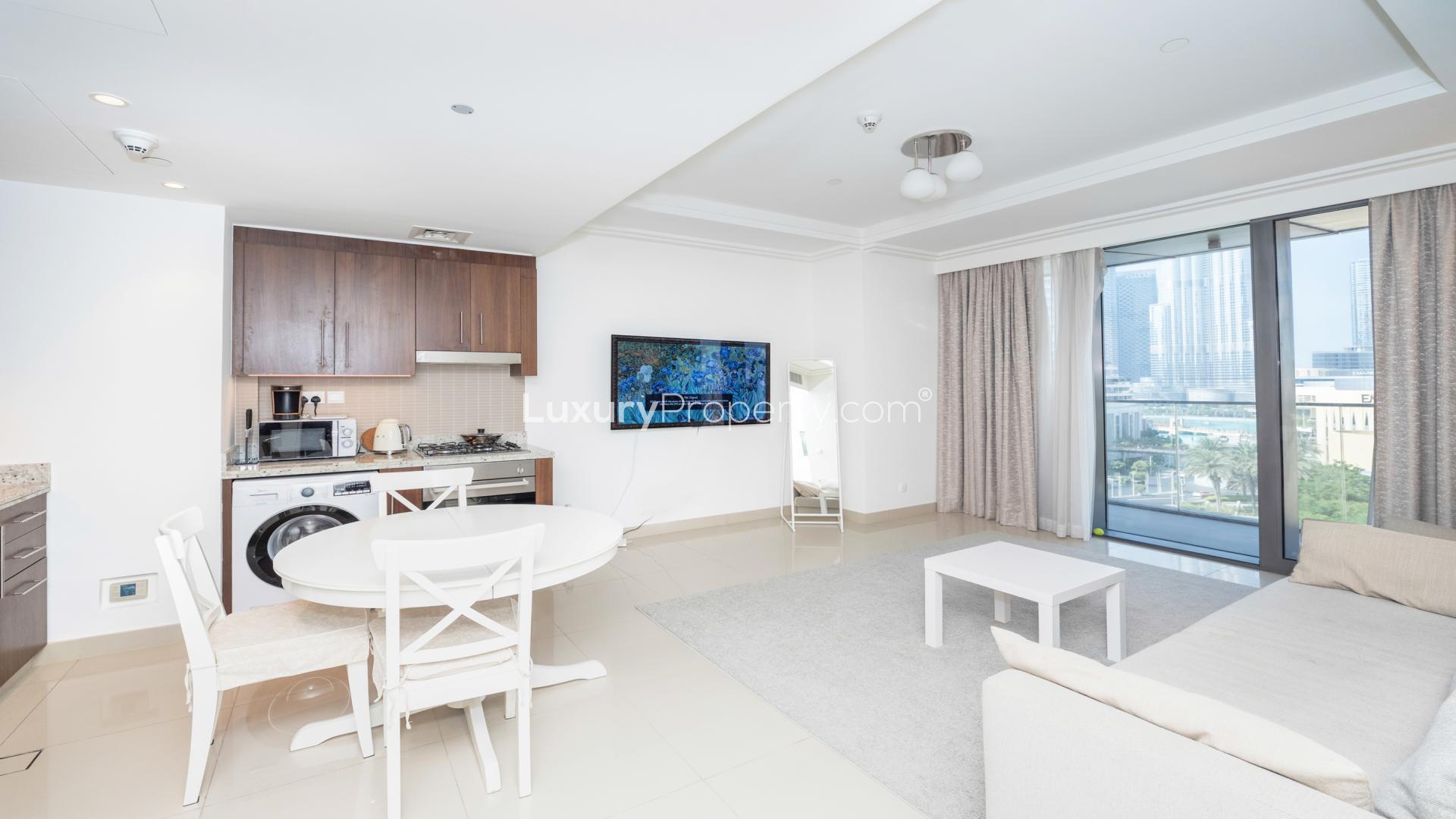 Balcony view from 1-bedroom apartment in Boulevard Point, Downtown Dubai with city skyline