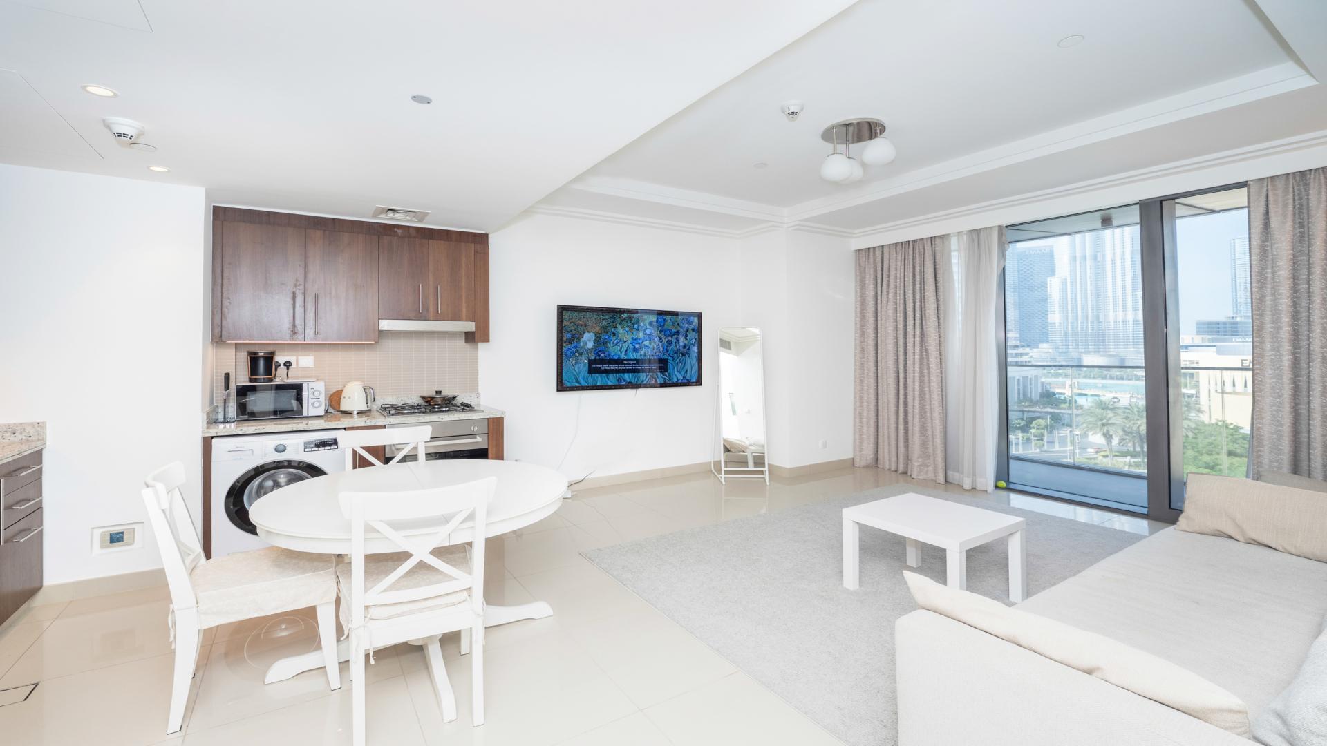 Balcony view from 1-bedroom apartment in Boulevard Point, Downtown Dubai with city skyline