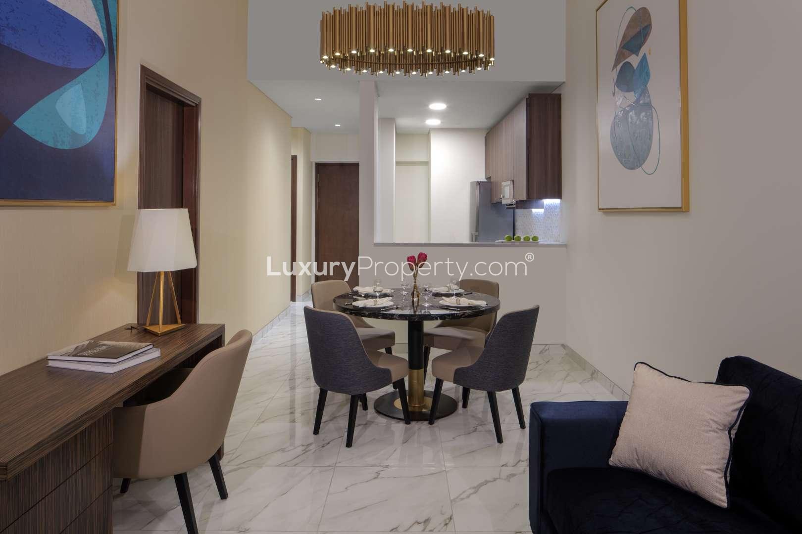 Elegant Avani Palm View Apartment Building in Dubai Media City at Sunset