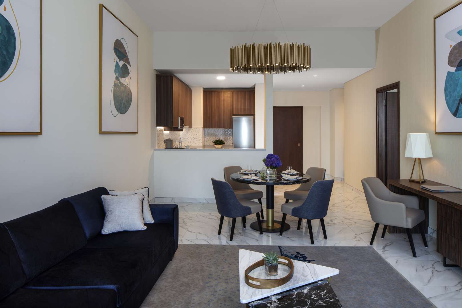 Stylish living room and dining area in 1-bedroom apartment at Avani Palm View, Dubai