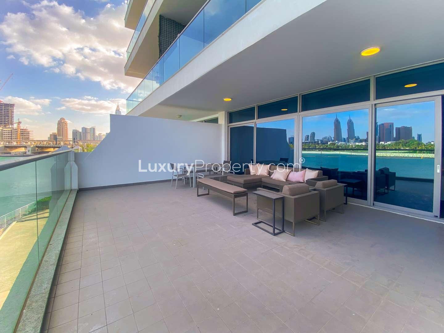 Infinity pool with city skyline view at Azure Residences, Palm Jumeirah apartment for rent