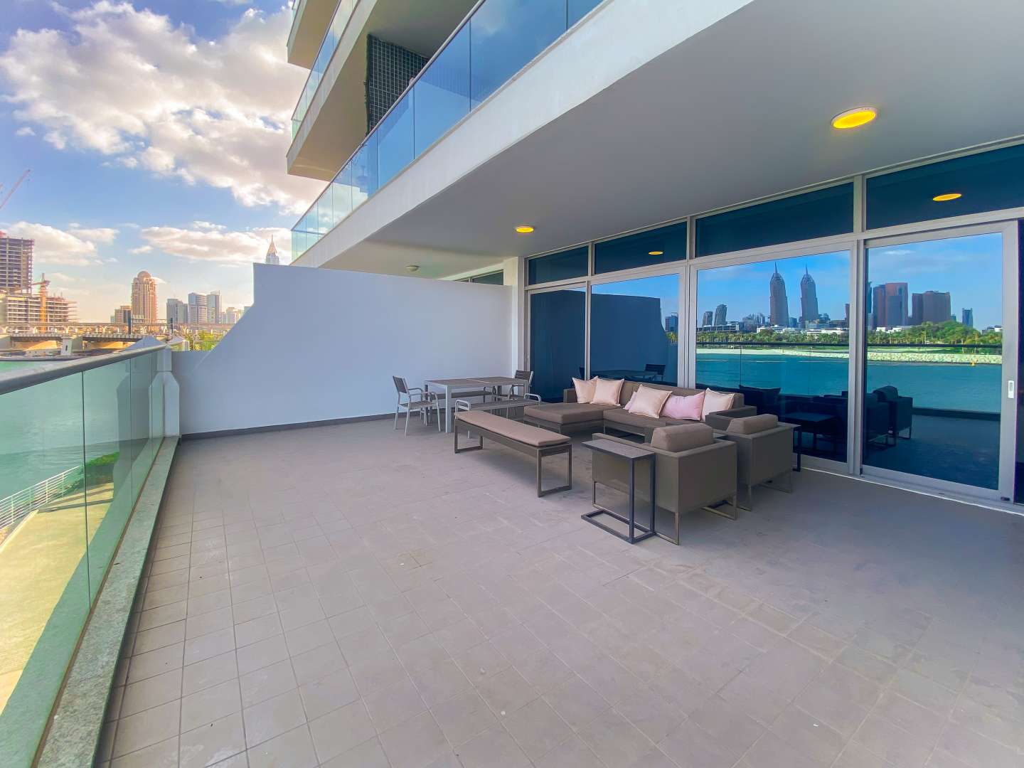 Infinity pool with city skyline view at Azure Residences, Palm Jumeirah apartment for rent