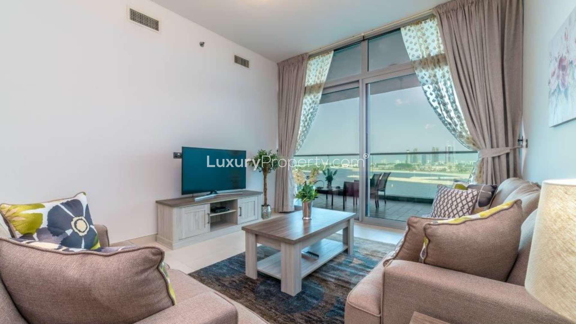 Fully furnished living room with sea view in Palm Jumeirah apartment for rent