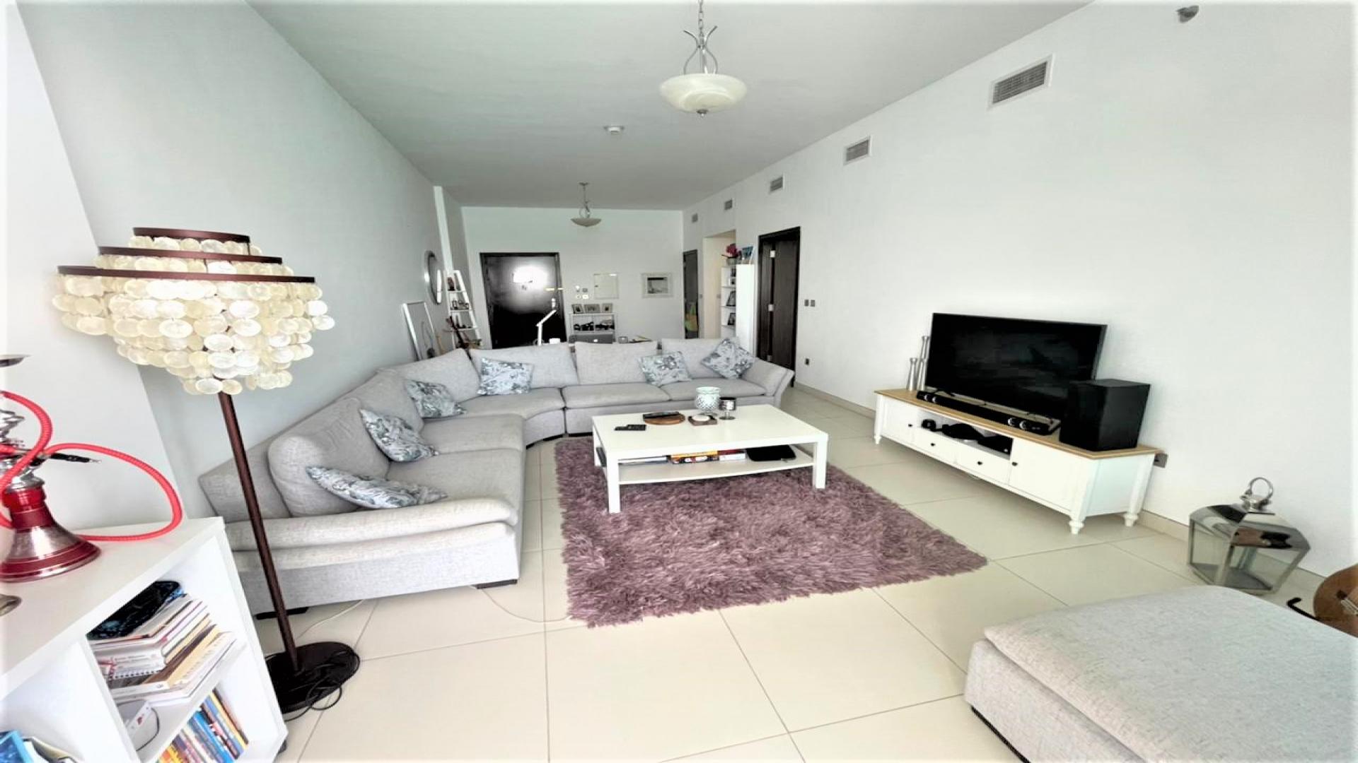 Beachfront view from apartment balcony in Azure Residences, Palm Jumeirah, with turquoise waters