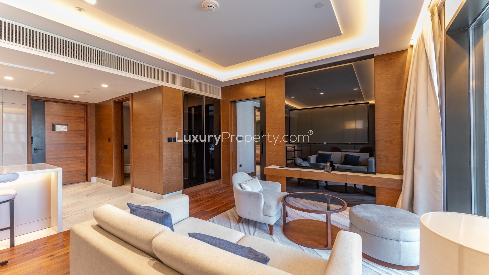 Modern apartment complex with pool view at Caesars Bluewaters Dubai, near the sea