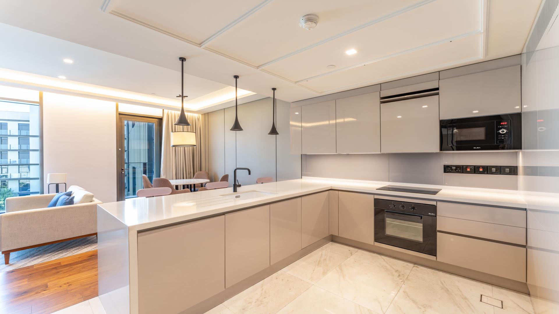 Modern furnished living area in 1-bedroom apartment at Caesars Bluewaters Dubai, available for rent