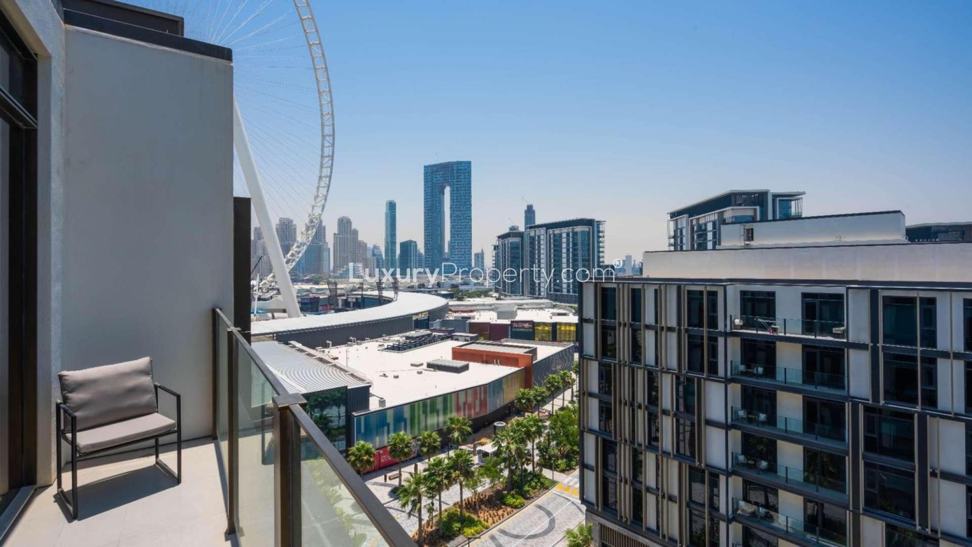 Modern living room in fully furnished Bluewaters Island apartment, featuring elegant decor and natural light