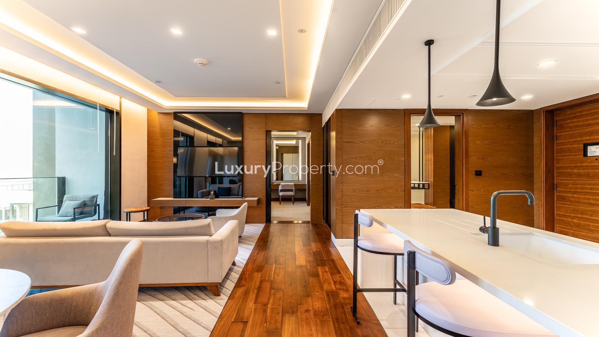 Modern living room in Caesars Bluewaters Dubai apartment, featuring stylish furniture and open layout