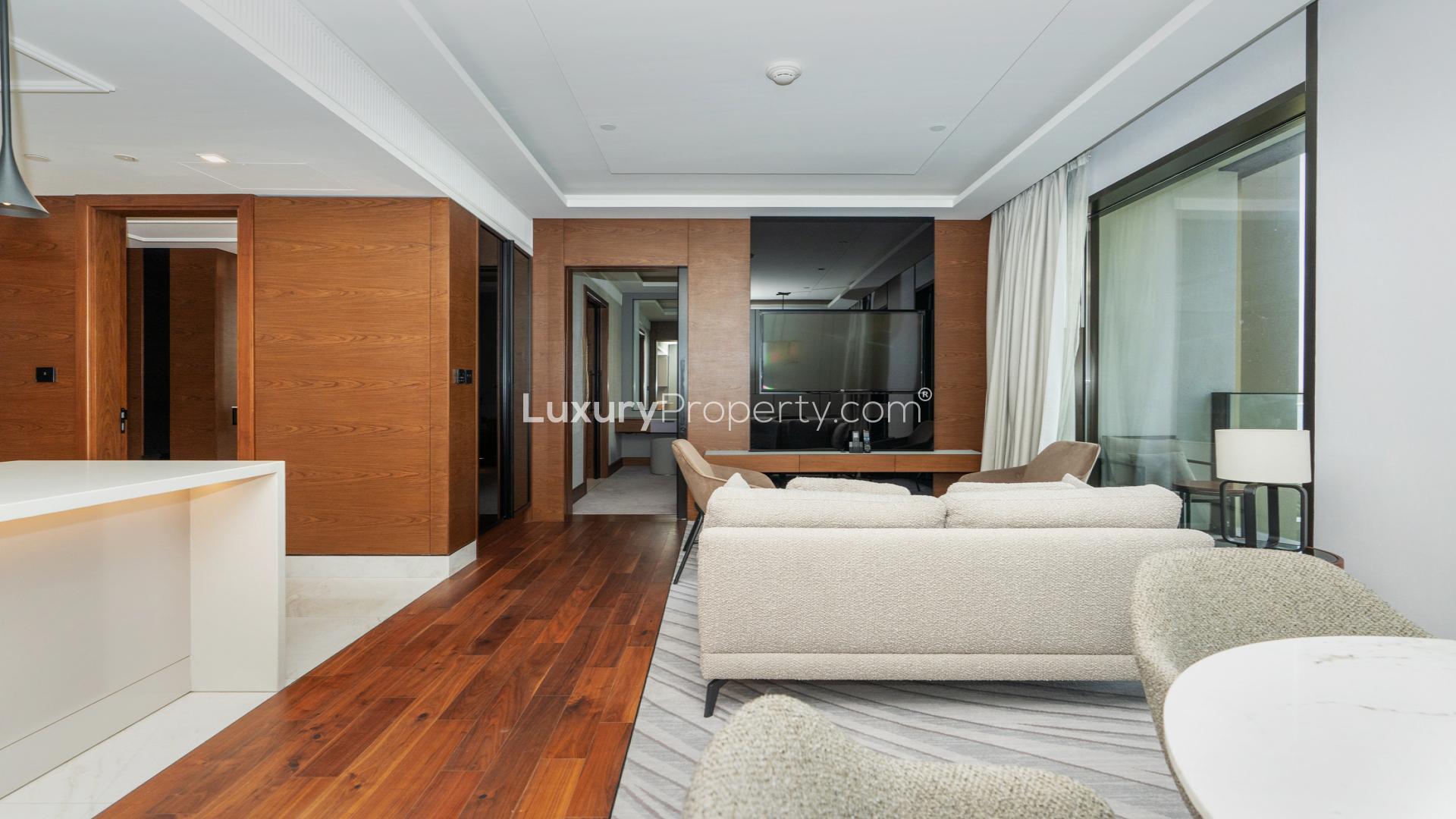 Modern living area in 1-bedroom apartment, Bluewaters, Dubai. Open layout with stylish furnishings