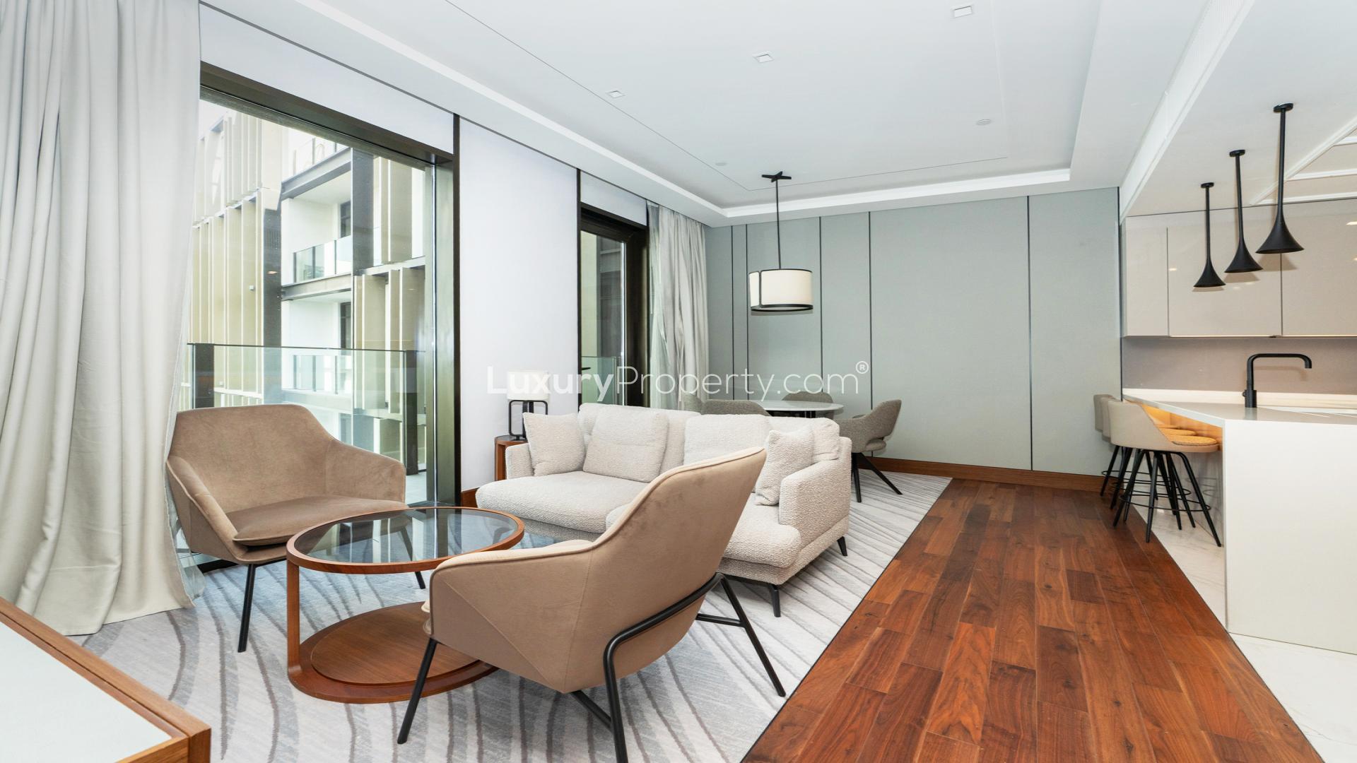 Luxurious living room in Caesars Bluewaters Dubai apartment, featuring modern decor and sea view