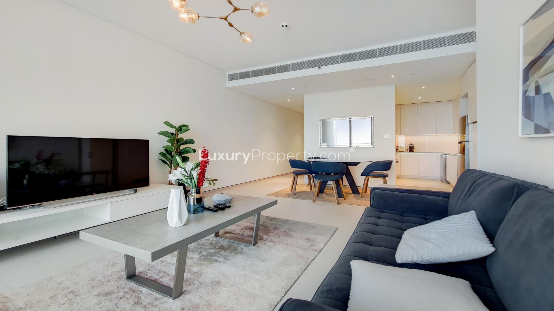 Aerial view of Jumeirah Beach Residence near Address Jumeirah Gate, showcasing marina and skyline