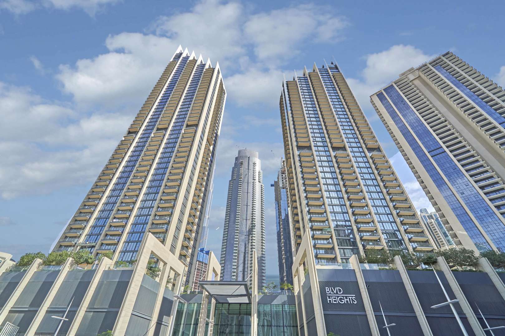Outdoor area at Boulevard Heights, Downtown Dubai with skyscrapers in the background