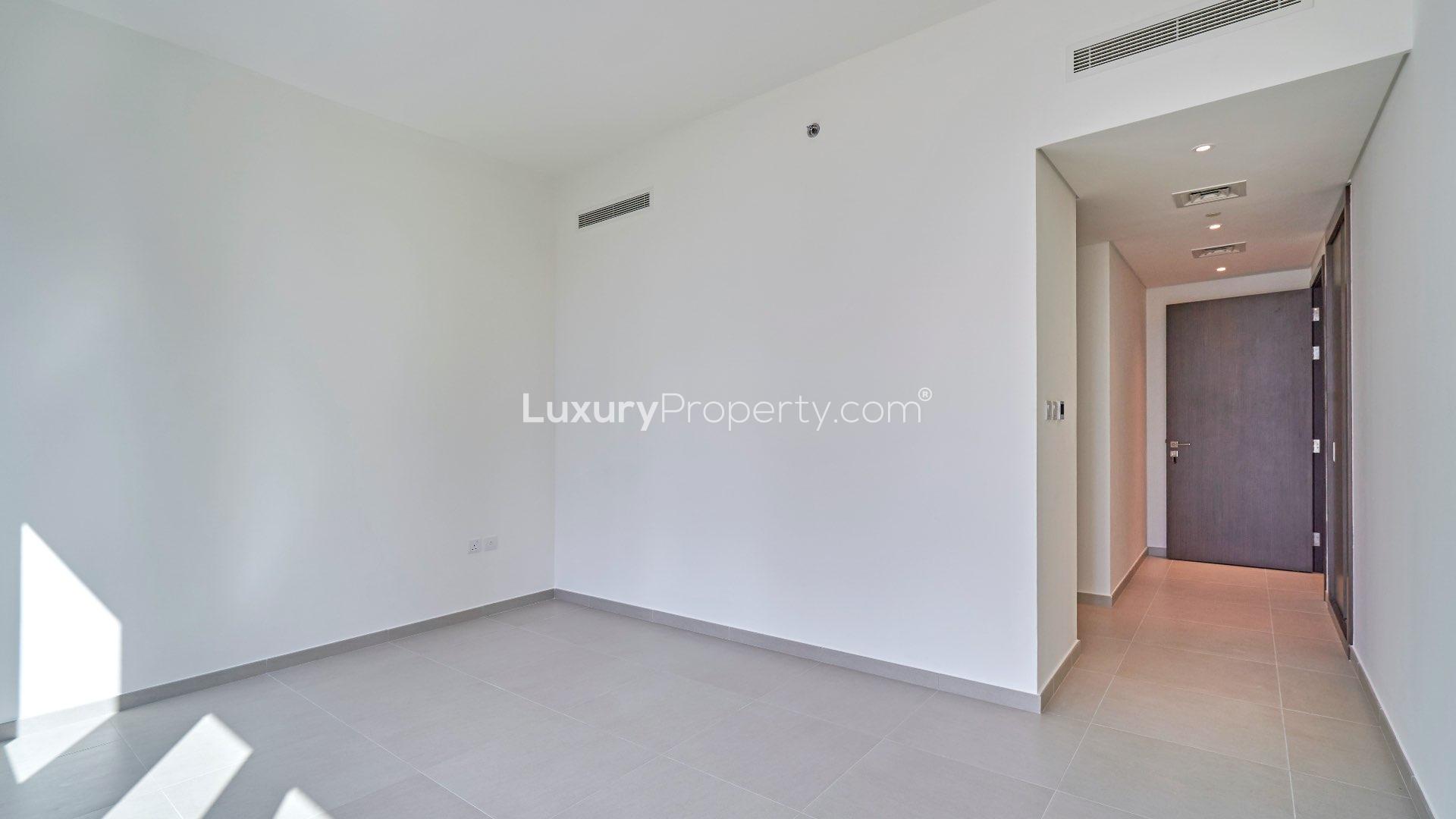 Aerial view of pool and lounge area at Boulevard Heights, Downtown Dubai apartment