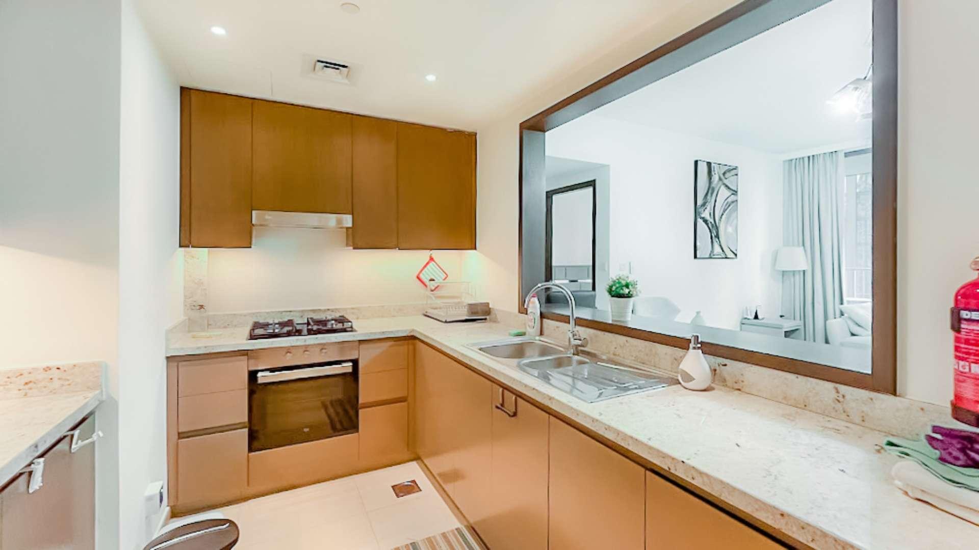 Modern kitchen in fully furnished 1-bed apartment, BLVD Heights, Downtown Dubai, for rent