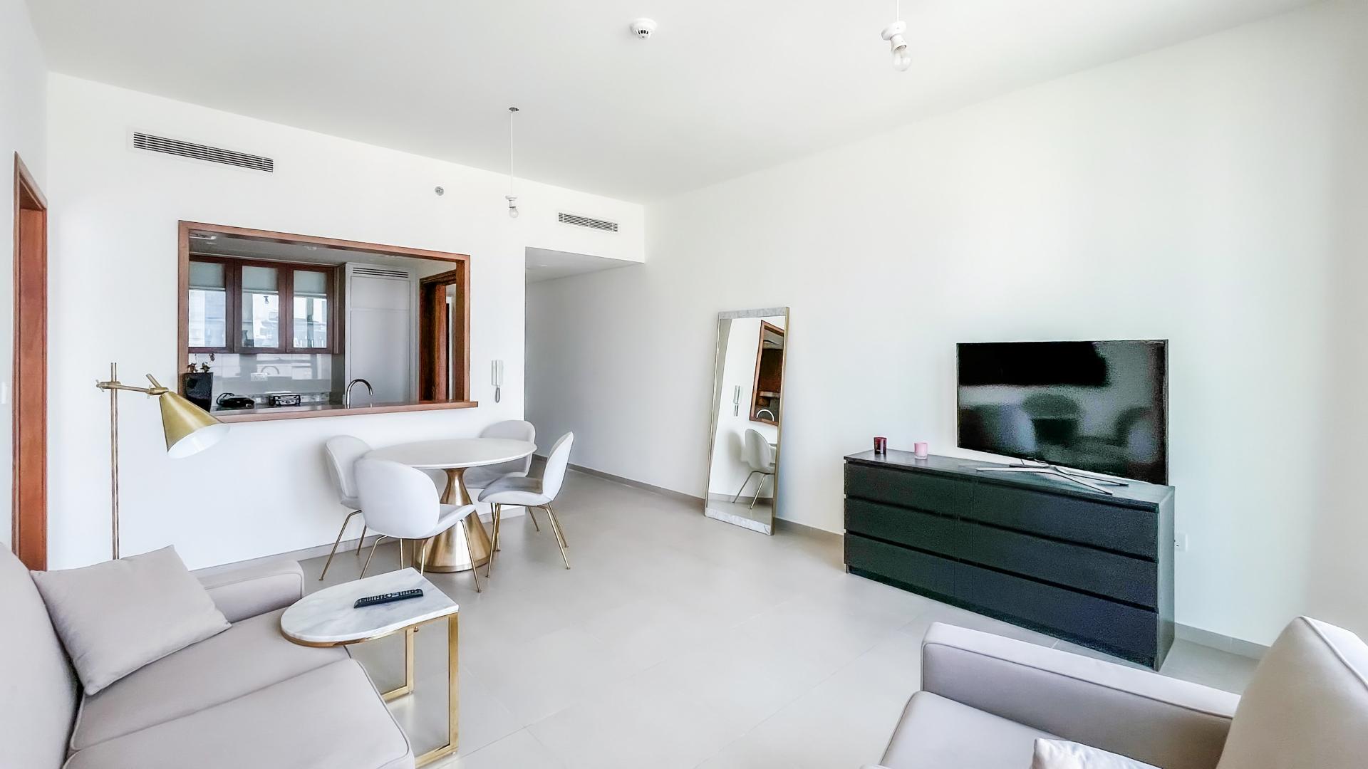 Modern living room in furnished 1-bedroom apartment, BLVD Heights, Downtown Dubai, for rent