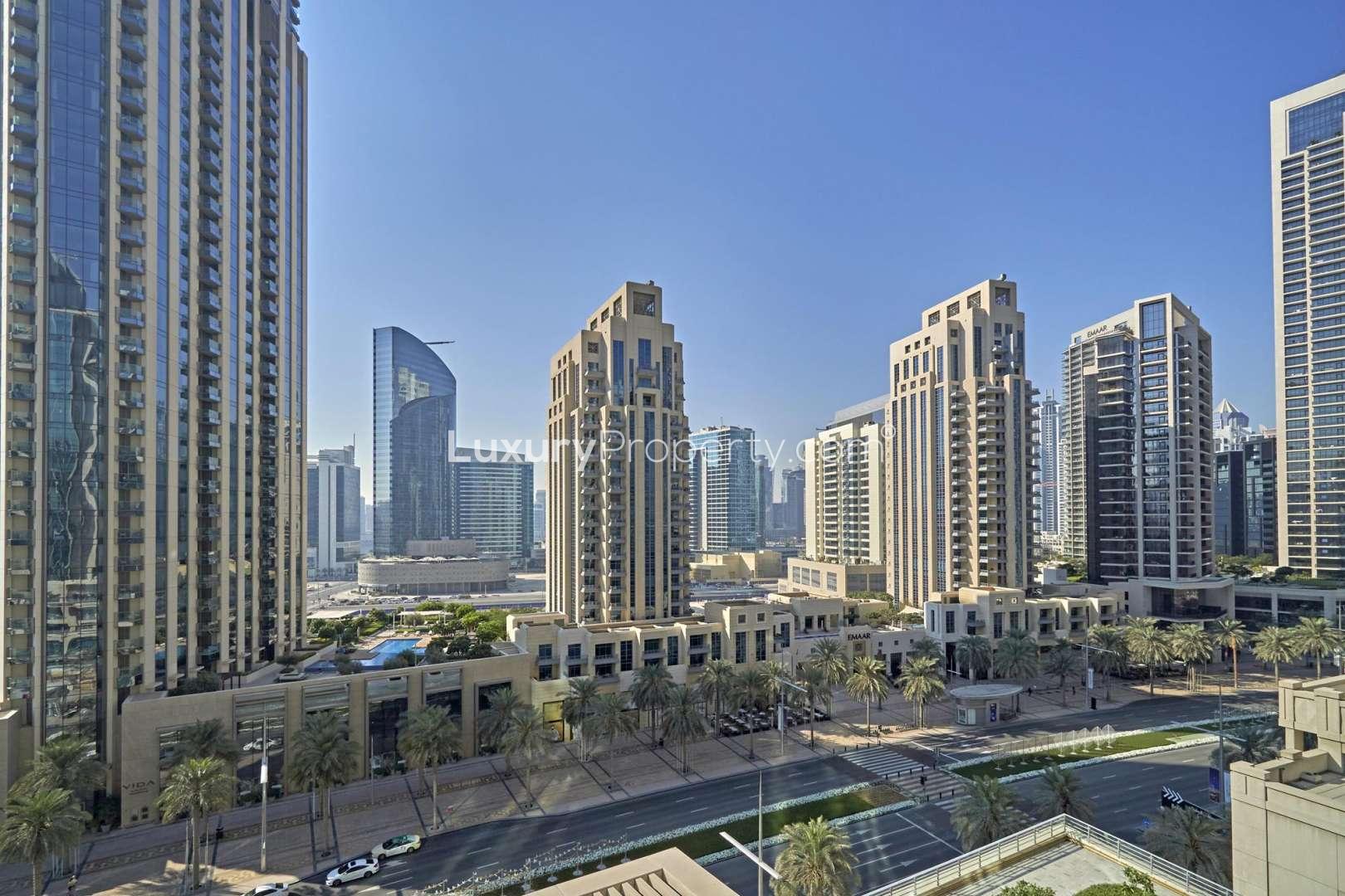Balcony view from one-bedroom apartment in Boulevard Central, Downtown Dubai with city skyline