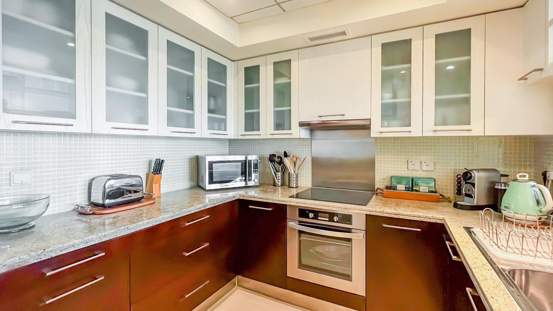 Upgraded 1-bedroom furnished apartment living area in Boulevard Central Downtown Dubai for rent