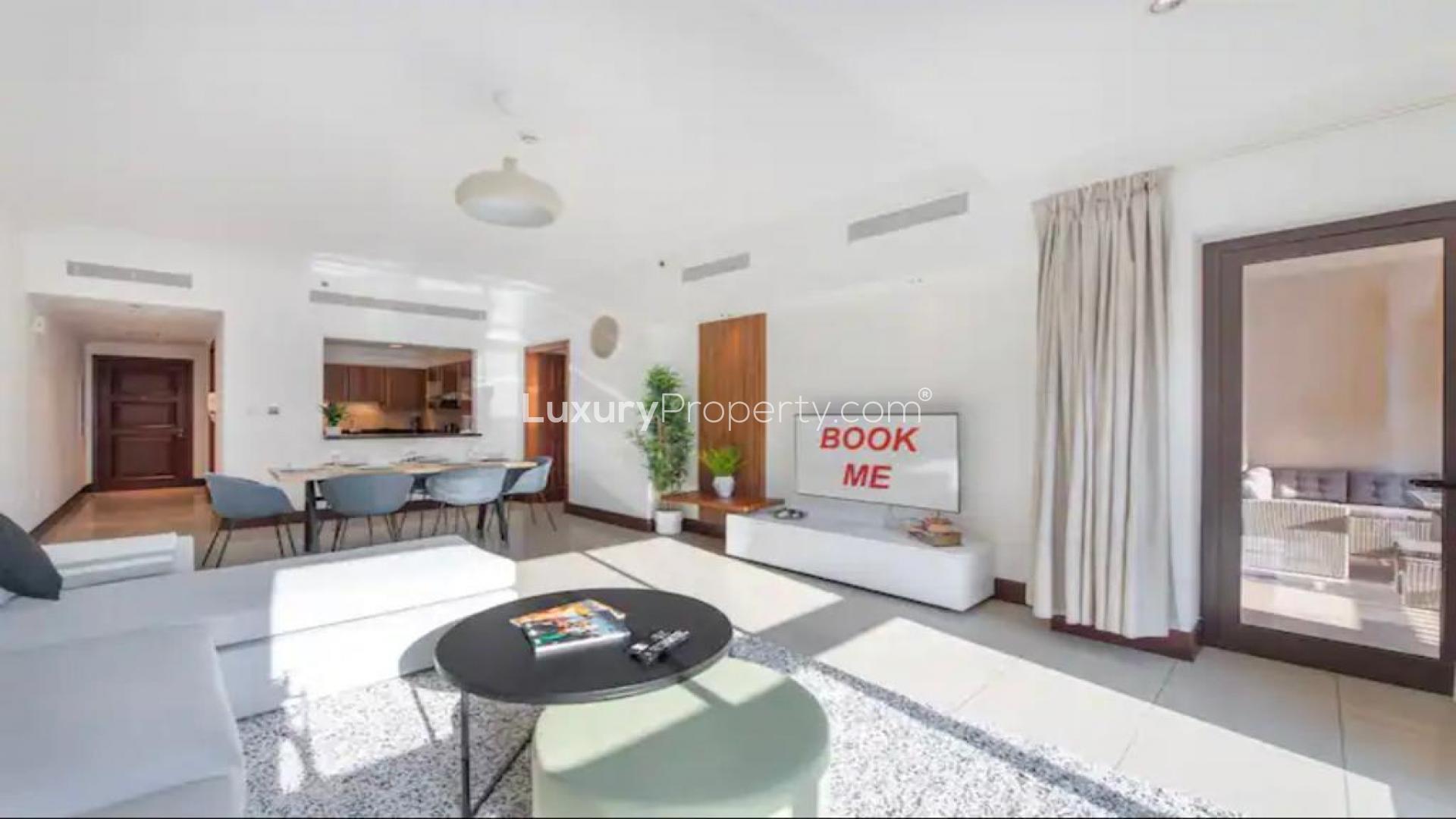 Modern living room in Golden Mile, Palm Jumeirah apartment with stylish decor and open layout