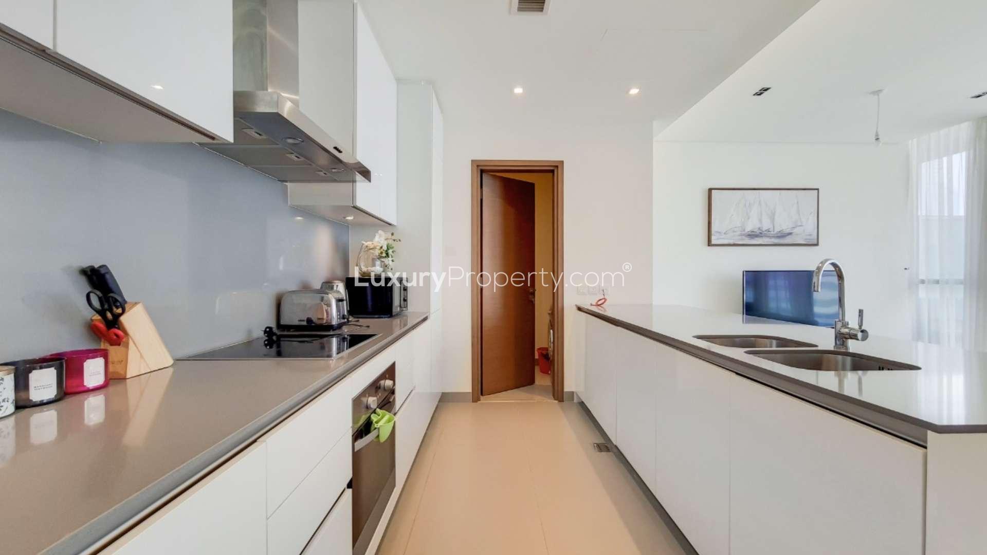 Spacious, fully furnished apartment living room with modern decor in City Walk, Building 22