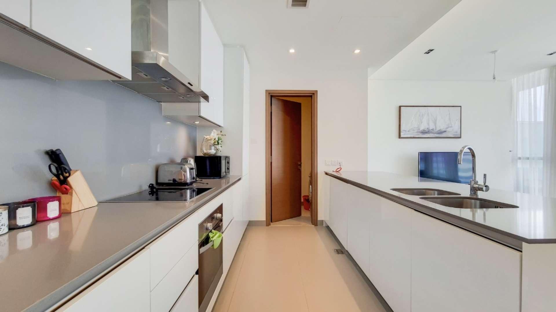 Spacious, fully furnished apartment living room with modern decor in City Walk, Building 22