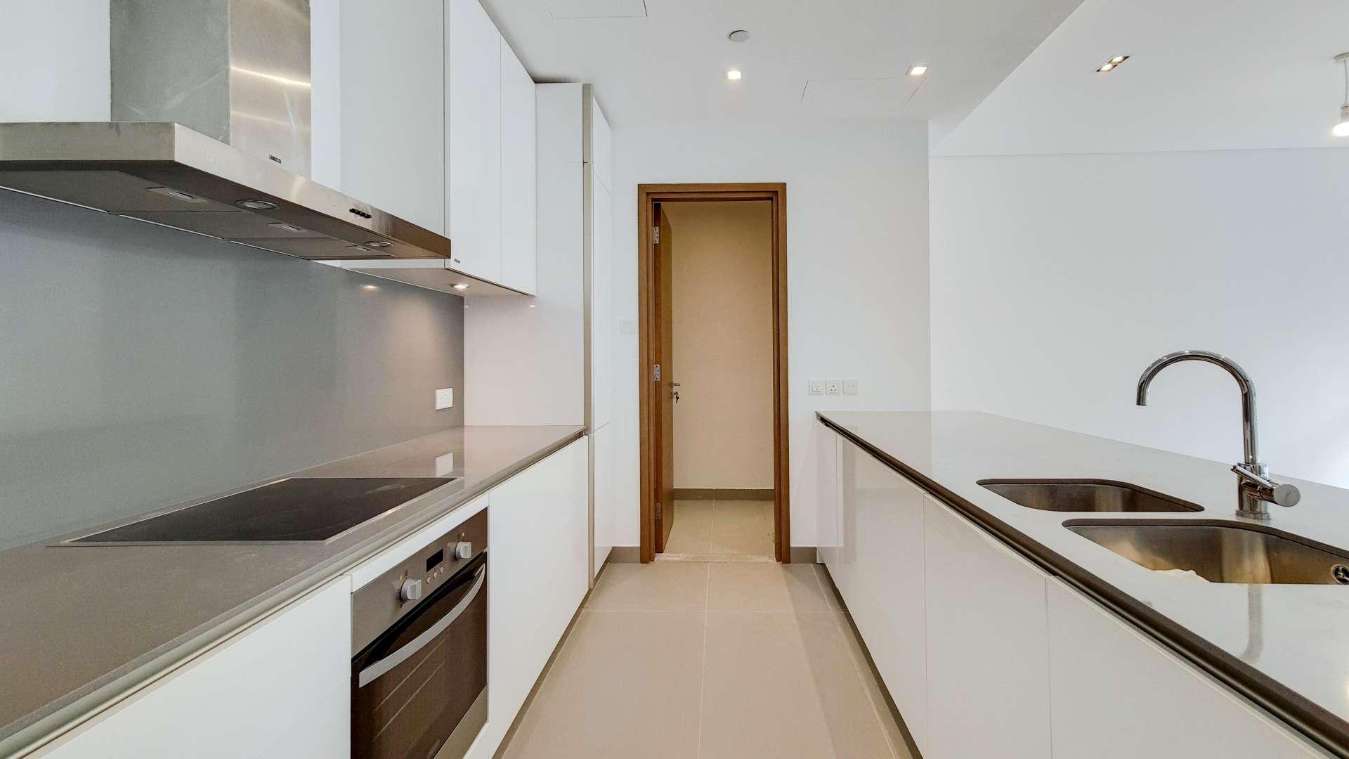 Contemporary 1-bedroom apartment with large windows and garden view in City Walk