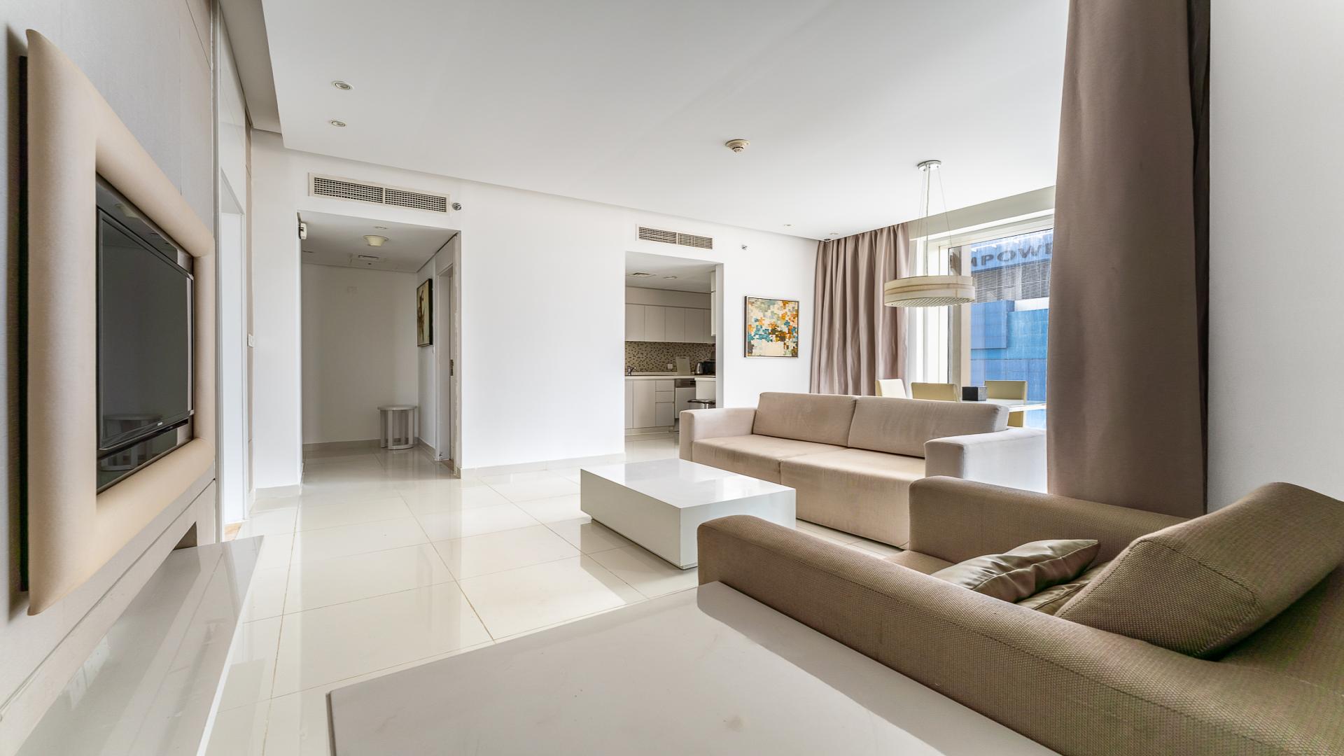Modern living room in 1-bedroom apartment at DAMAC Maison The Vogue, Business Bay