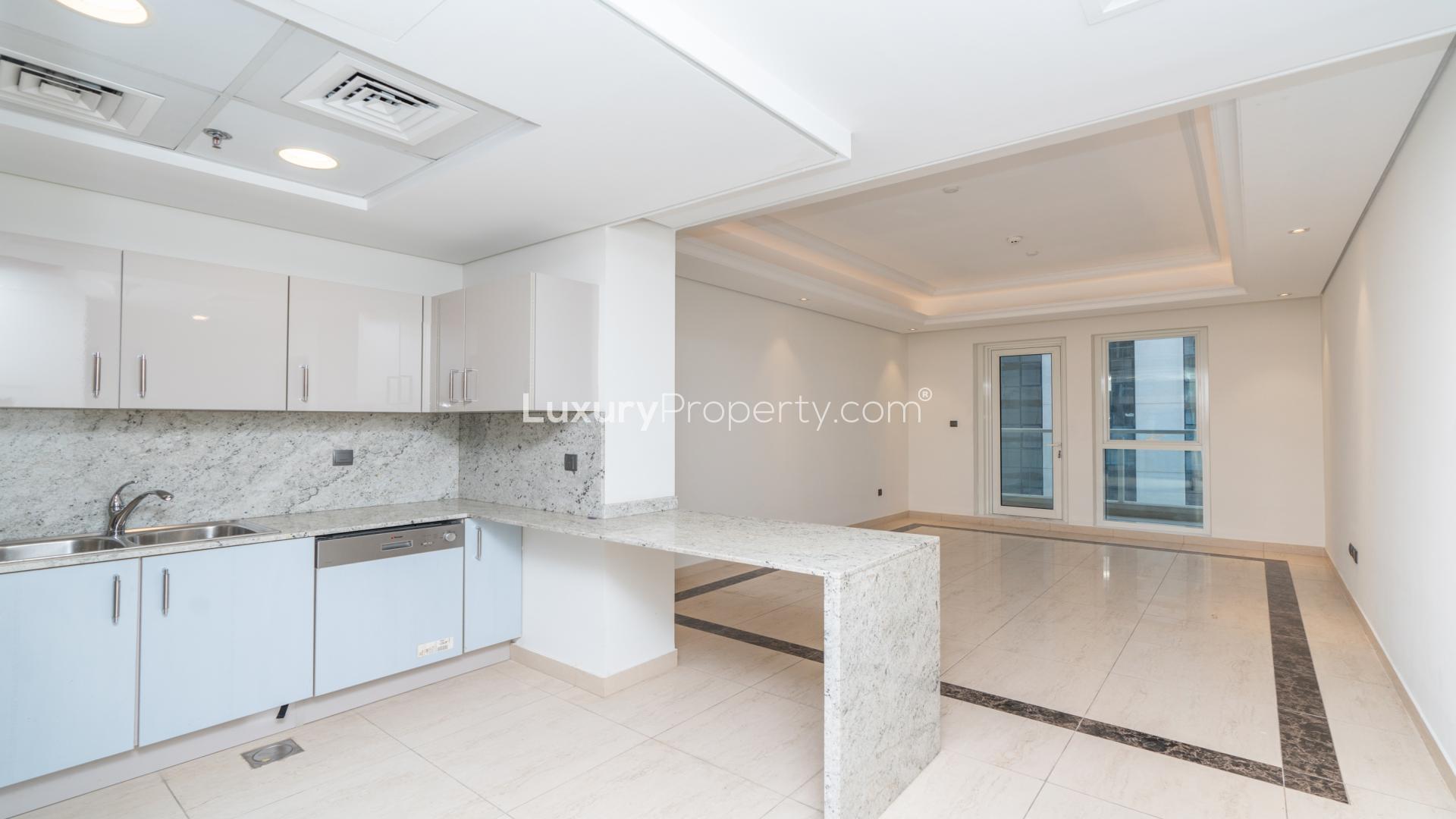 Empty living room in luxury 1-bedroom apartment, Mon Reve, Downtown Dubai