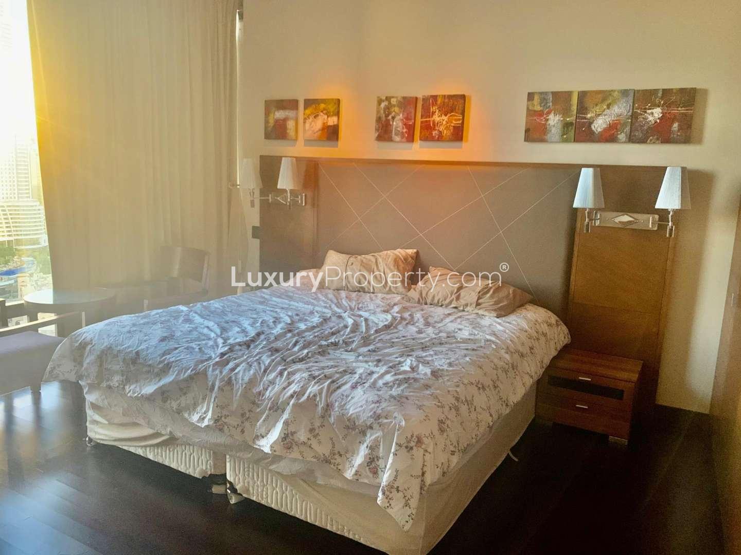 Furnished bedroom in Burj Khalifa apartment with city view, Downtown Dubai rental property