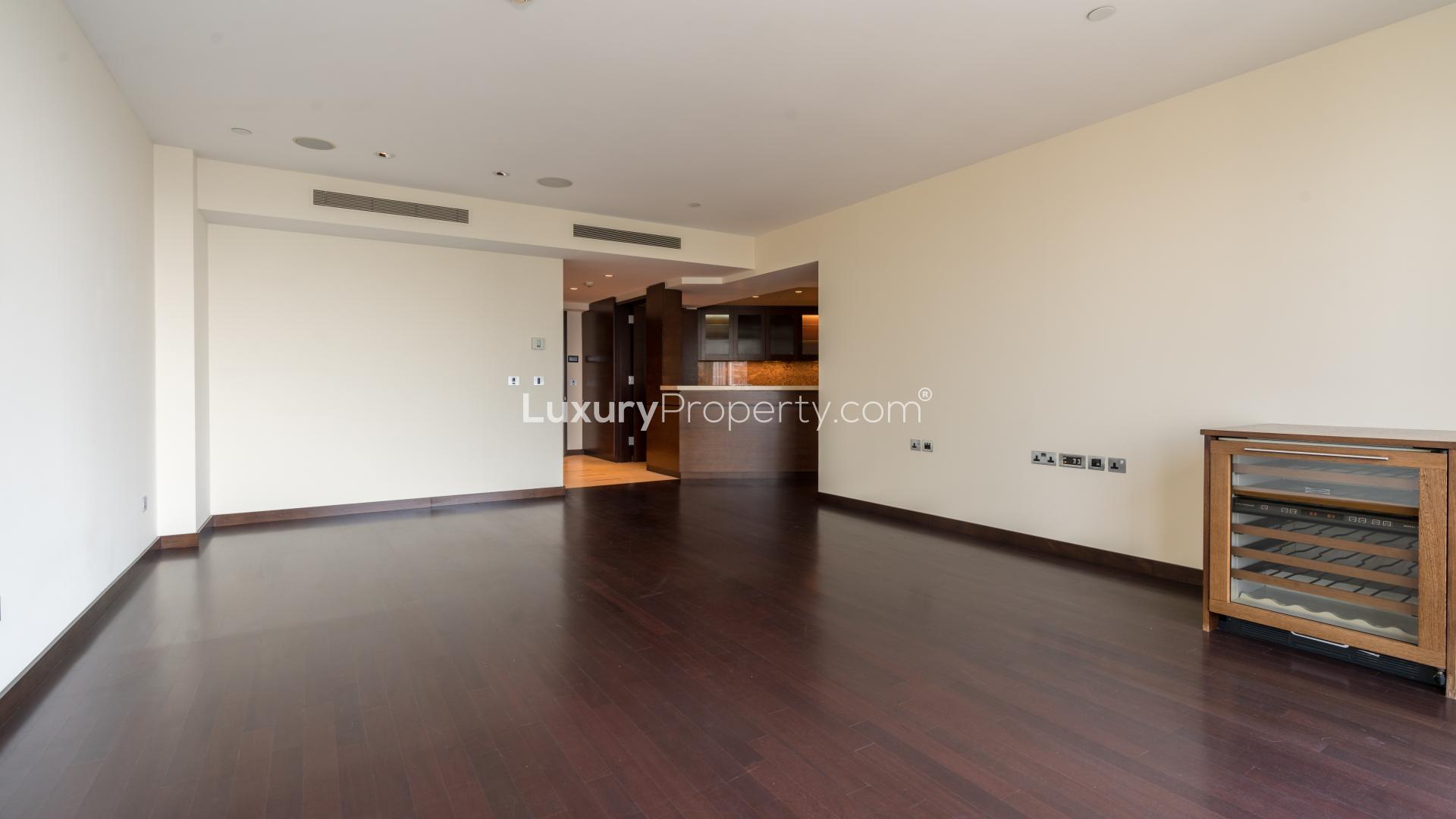 Spacious one-bedroom apartment interior, Downtown Dubai, Burj Khalifa Area, hardwood floors, modern design