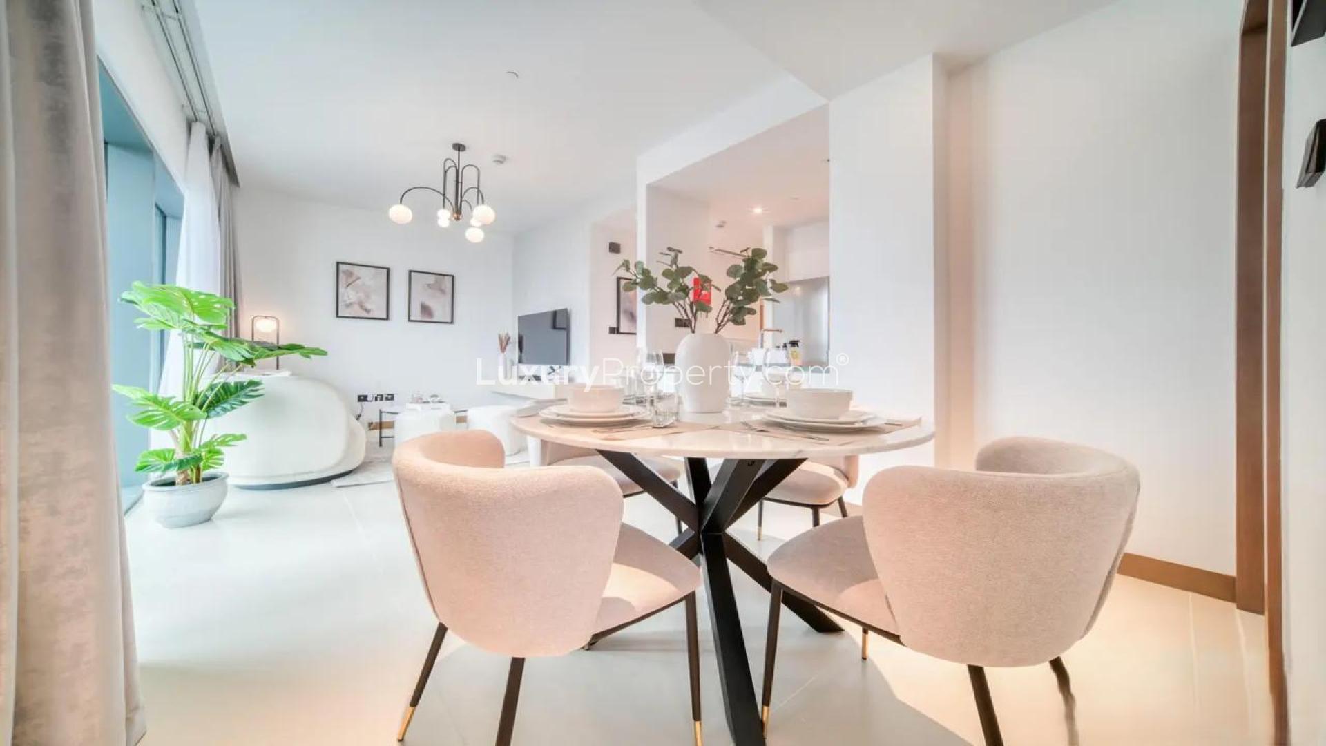 Modern living room in Vida Residences apartment, Dubai Marina, featuring stylish decor and city views