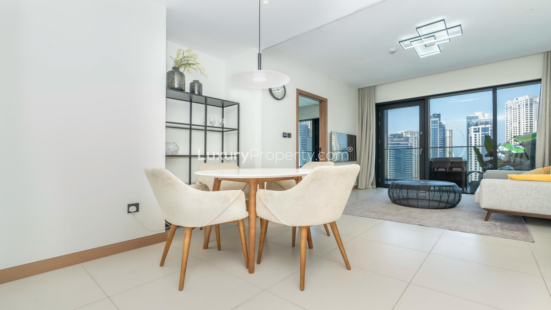 Modern living room in Vida Residences Dubai Marina apartment, featuring stylish decor and natural light