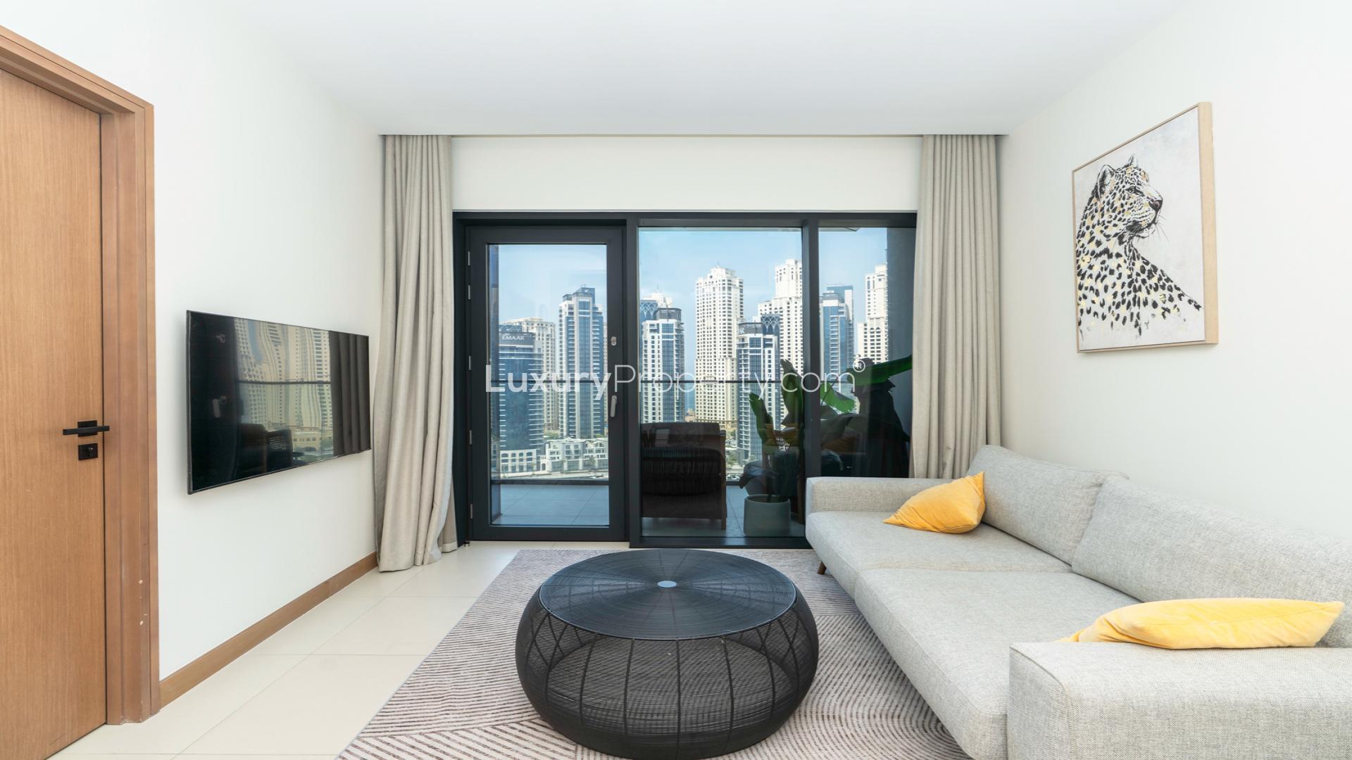 Dubai Marina apartment view with waterfront, yachts, and skyline from Vida Residences balcony