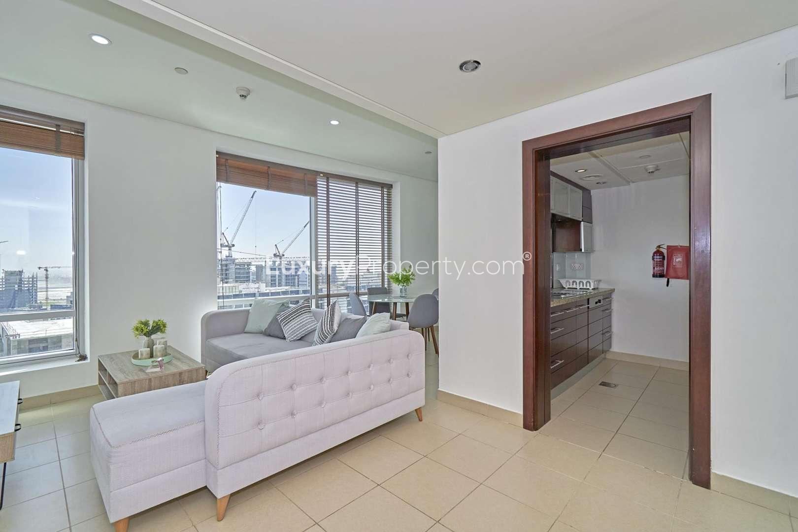 Fully furnished living room in 1-bedroom apartment, Burj Views Tower B, Downtown Dubai