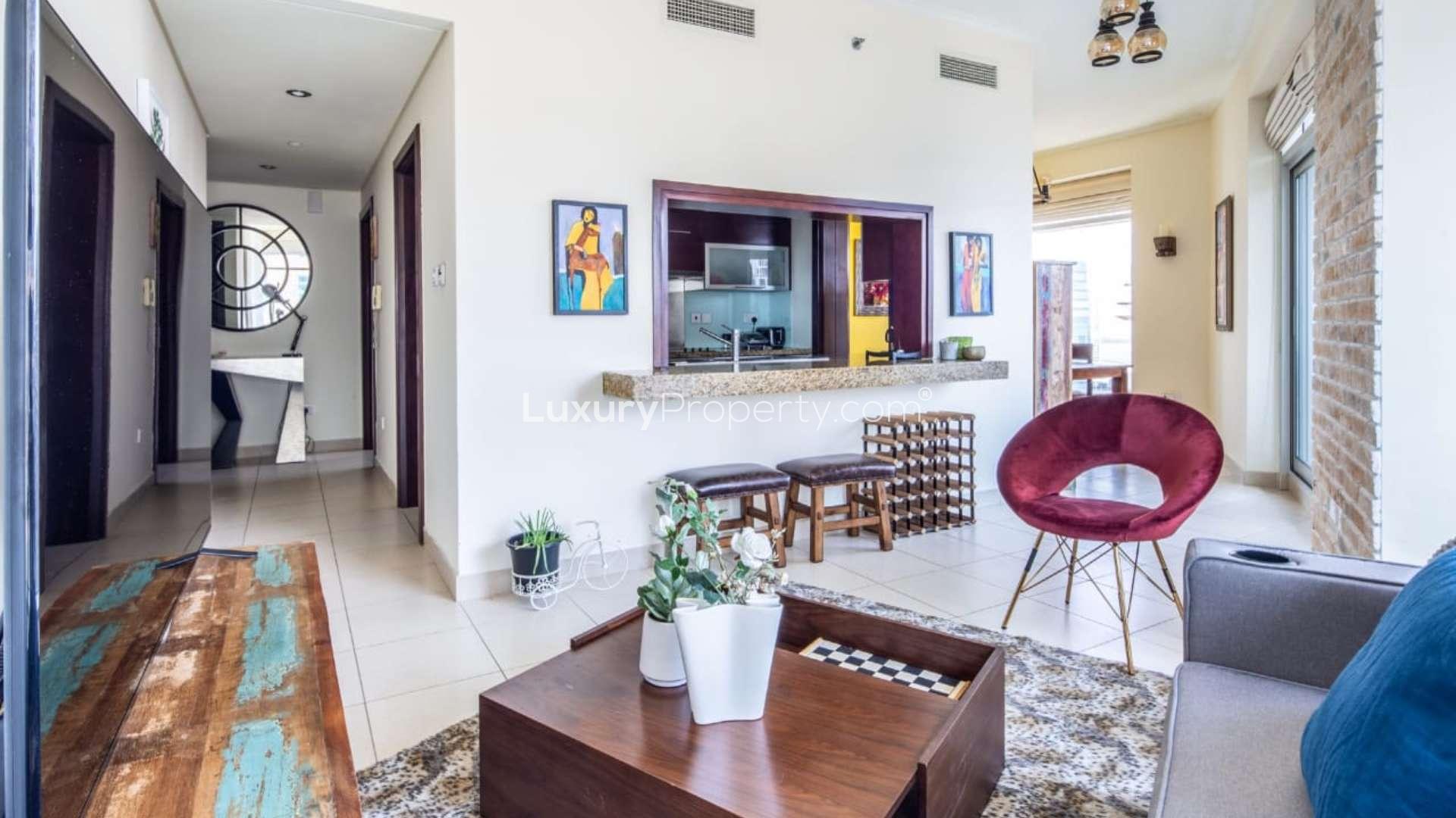 Furnished high-floor apartment living room with balcony in Burj Views, Downtown Dubai