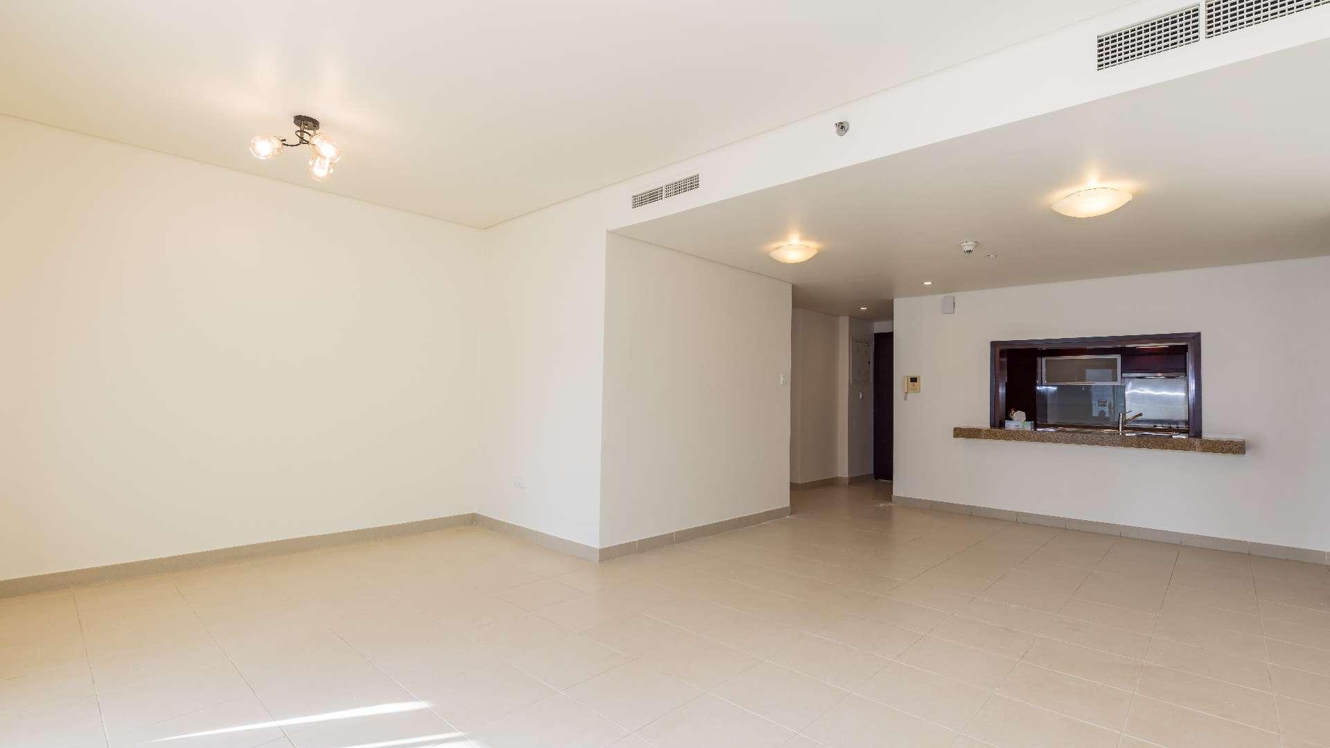 Balcony view from one-bedroom apartment in Burj Views, Downtown Dubai, showcasing city skyline