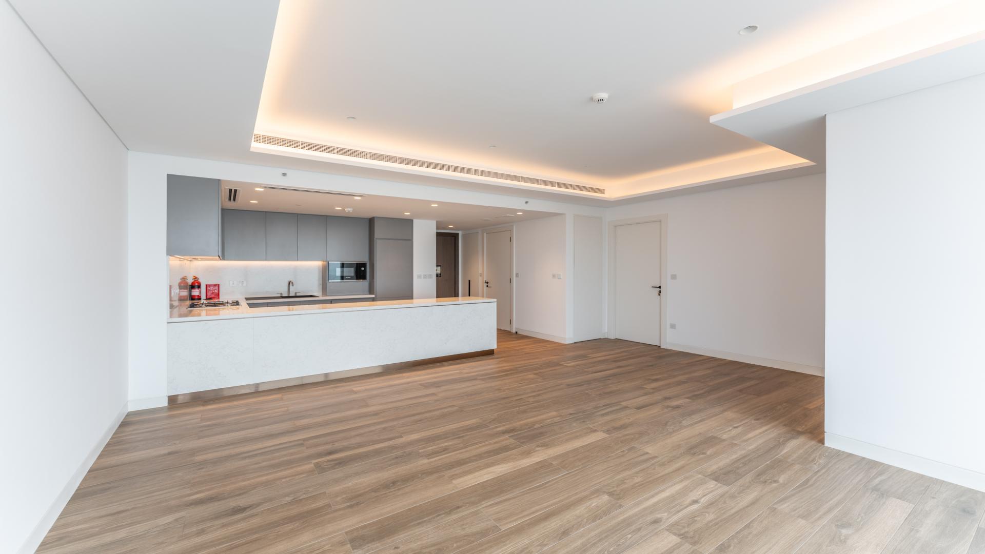 N/A,Modern kitchen and open living space in Uptown Tower apartment, Jumeirah Lake Towers, Dubai