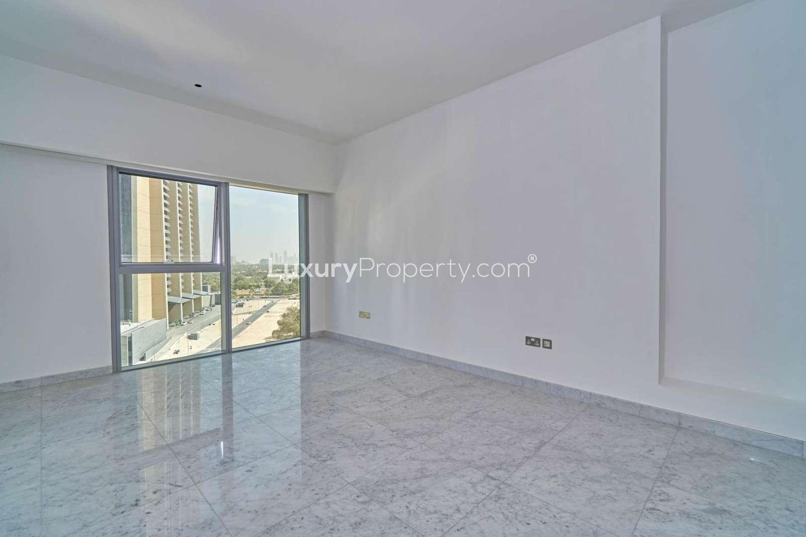 Open wardrobe in spacious 1-bedroom apartment, Central Park Tower, DIFC, for rent