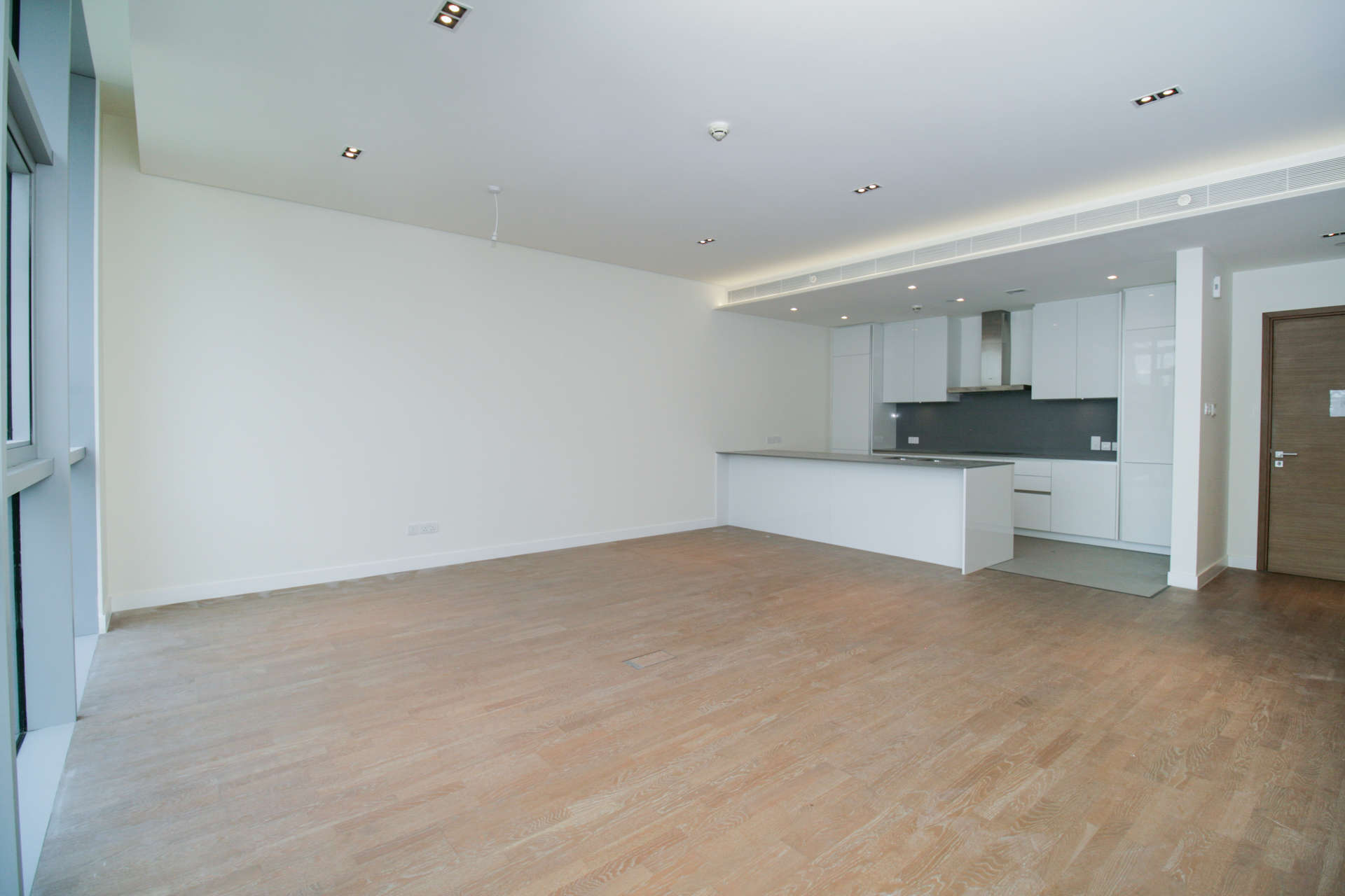 Contemporary one-bedroom apartment interior with large windows in City Walk, Building 20