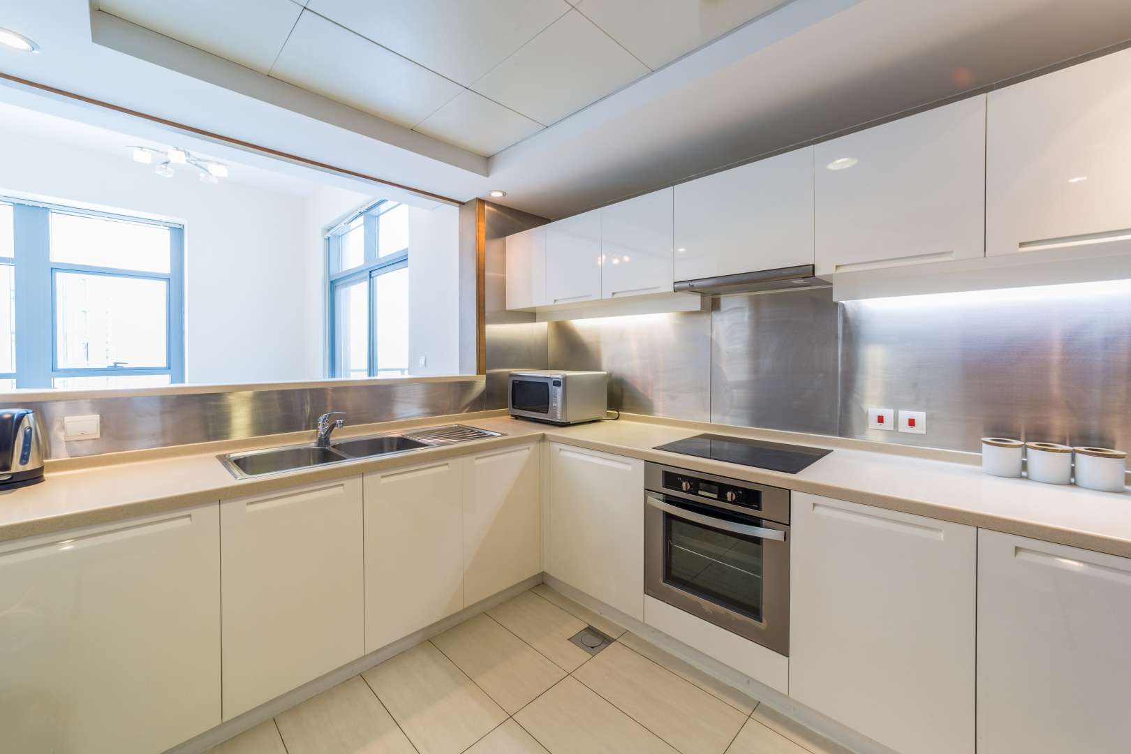 Modern living room in Claren Tower apartment, Downtown Dubai, with Burj Khalifa views