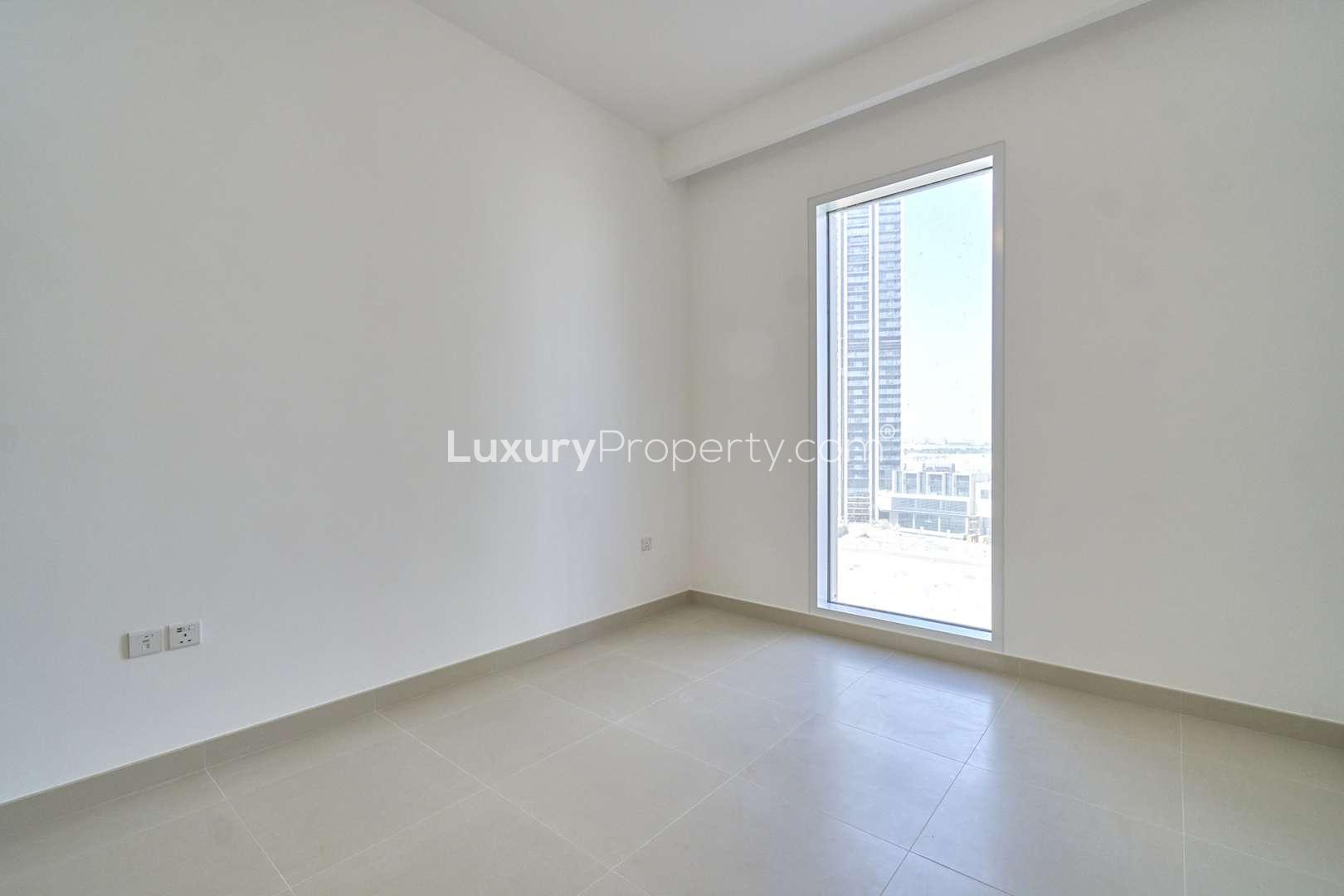 Newly built bedroom with built-in wardrobe in Creek Horizon, Dubai Creek Harbour apartment