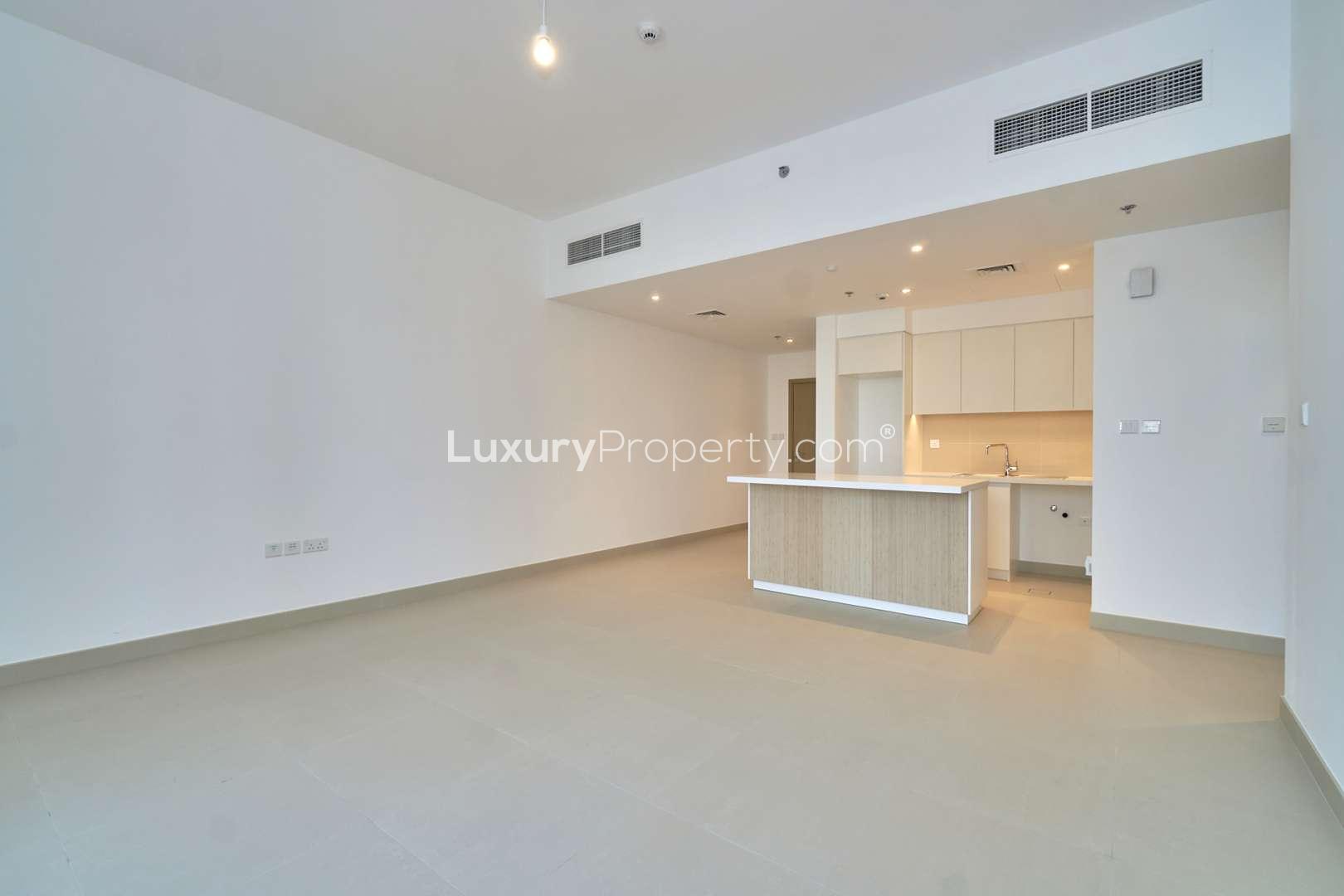 Empty bedroom in Creek Horizon apartment, Dubai Creek Harbour, with built-in wardrobe