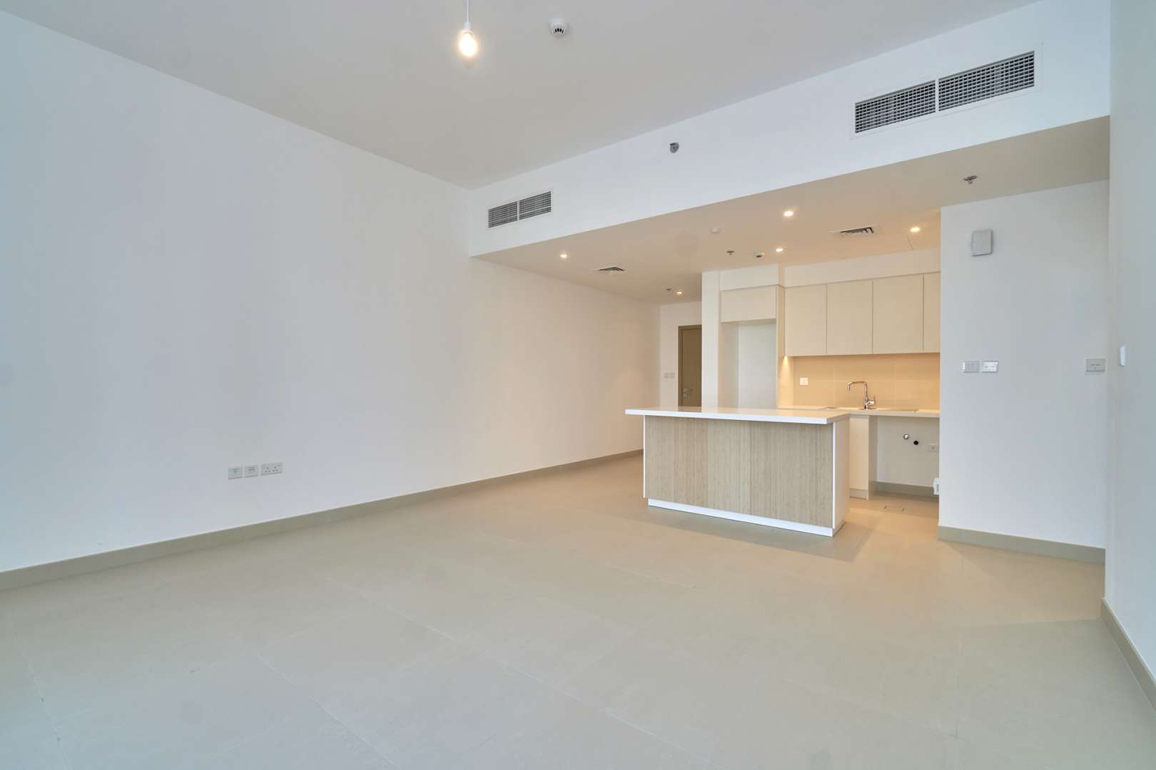 Empty bedroom in Creek Horizon apartment, Dubai Creek Harbour, with built-in wardrobe